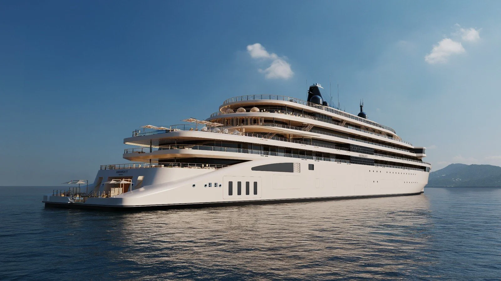 Amangati by Aman luxury yacht exterior view highlighting layered decks and spacious design of Aman at Sea’s inaugural yacht.