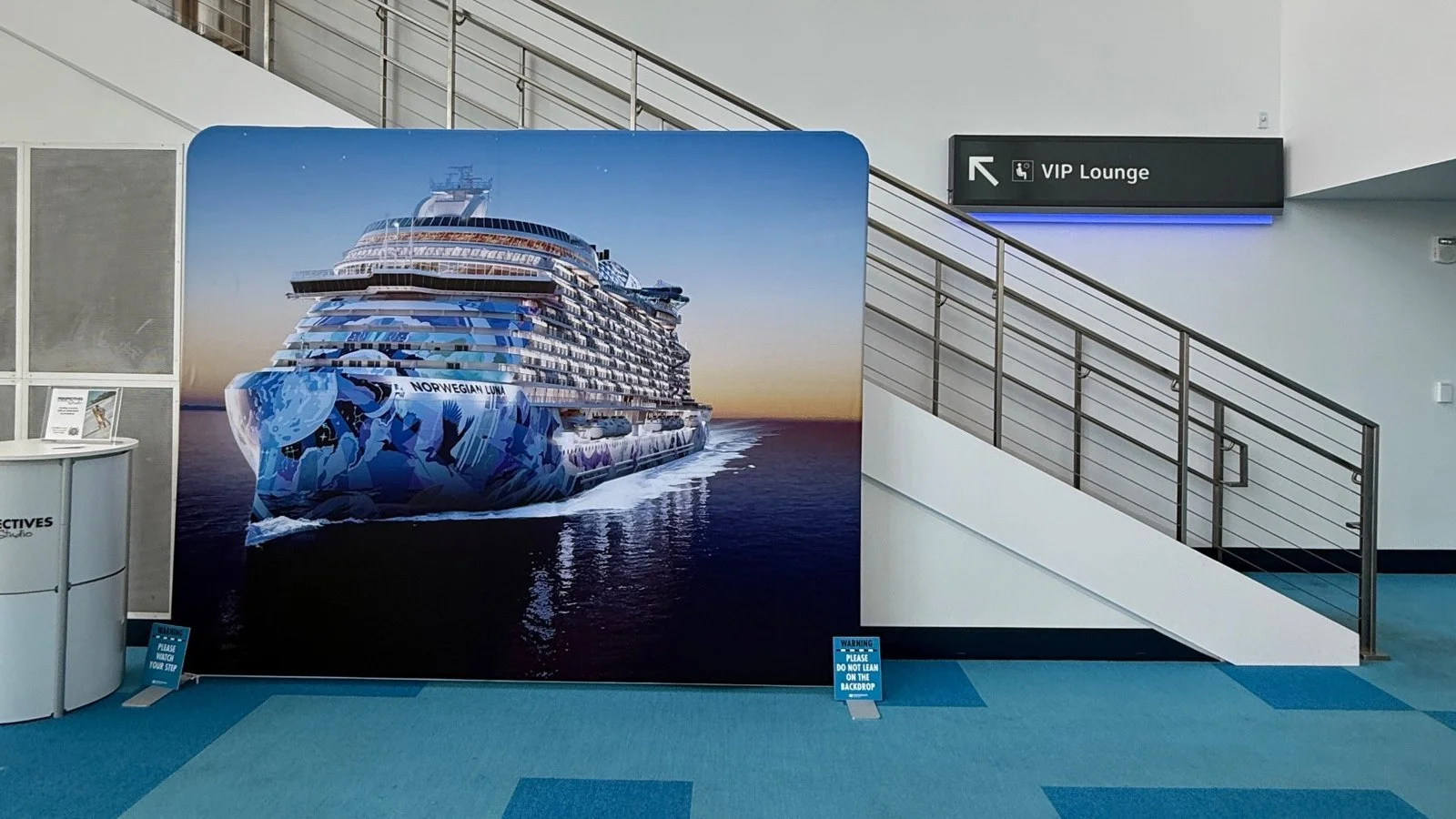 Norwegian Luna cruise ship signage inside Miami cruise terminal boarding area