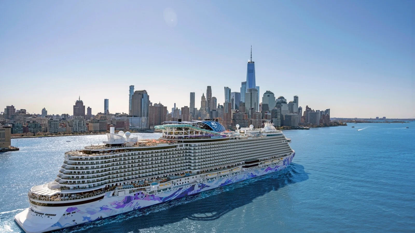 Norwegian Luna sailing past the New York skyline with One World Trade Center in view