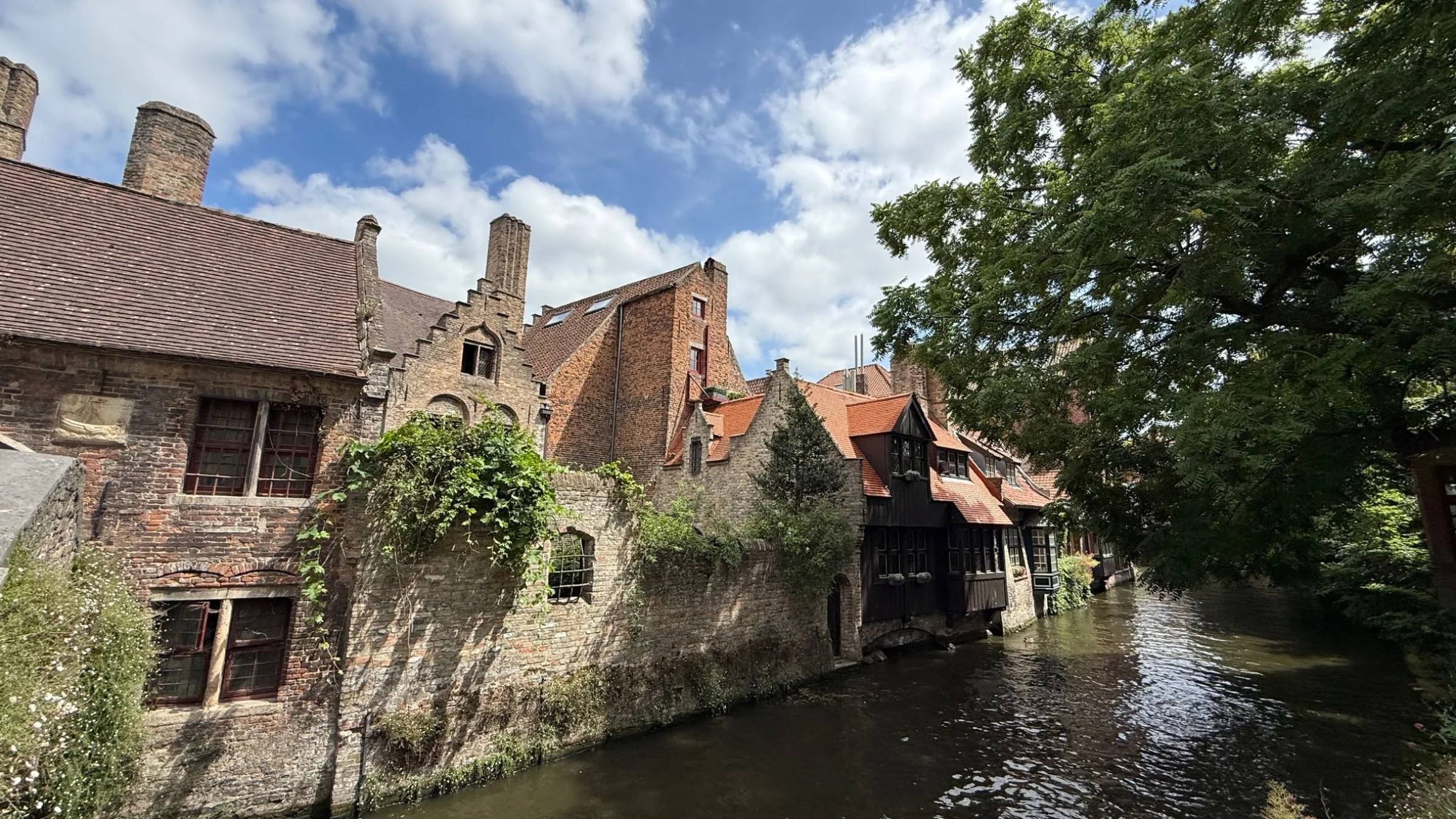 Historic canal houses along one of Bruges's most picturesque waterways.