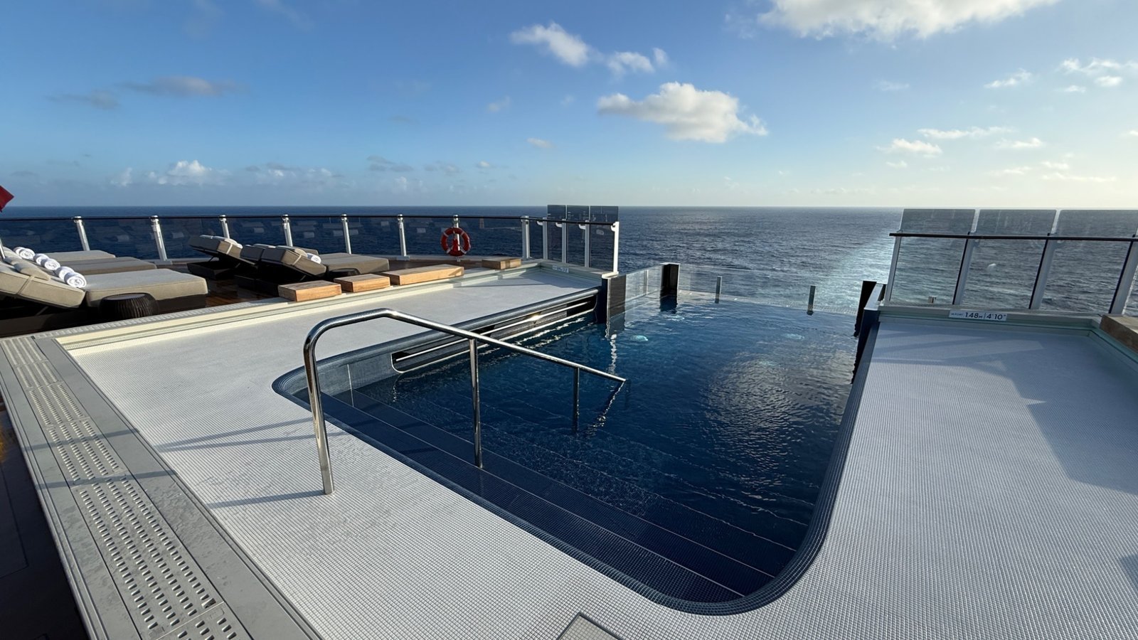 Infinity pool in The Haven on Norwegian Luna overlooking the ocean during Caribbean cruise