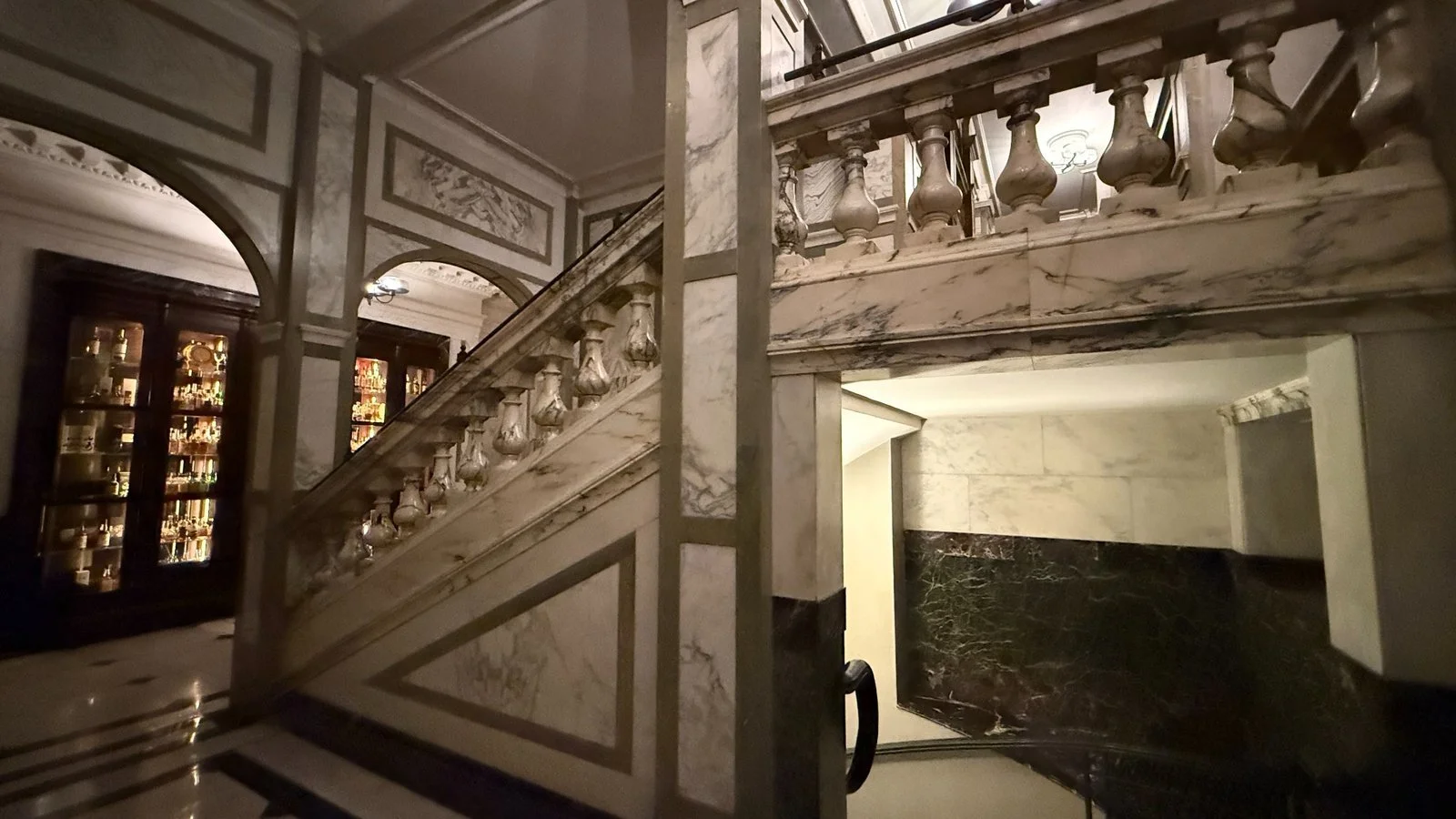 Grand marble staircase with classical balustrade inside Rosewood London