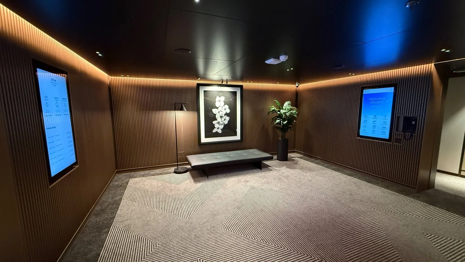 The Haven Private Elevators on Norwegian Luna with modern seating, ambient lighting and private guest area