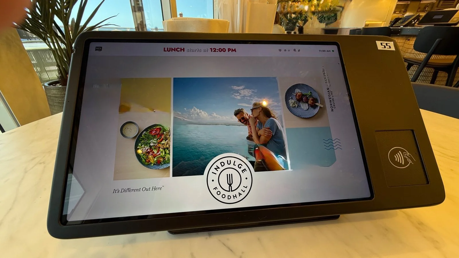 Digital ordering screen at Indulge Food Hall on Norwegian Luna showcasing dining options and onboard culinary experience