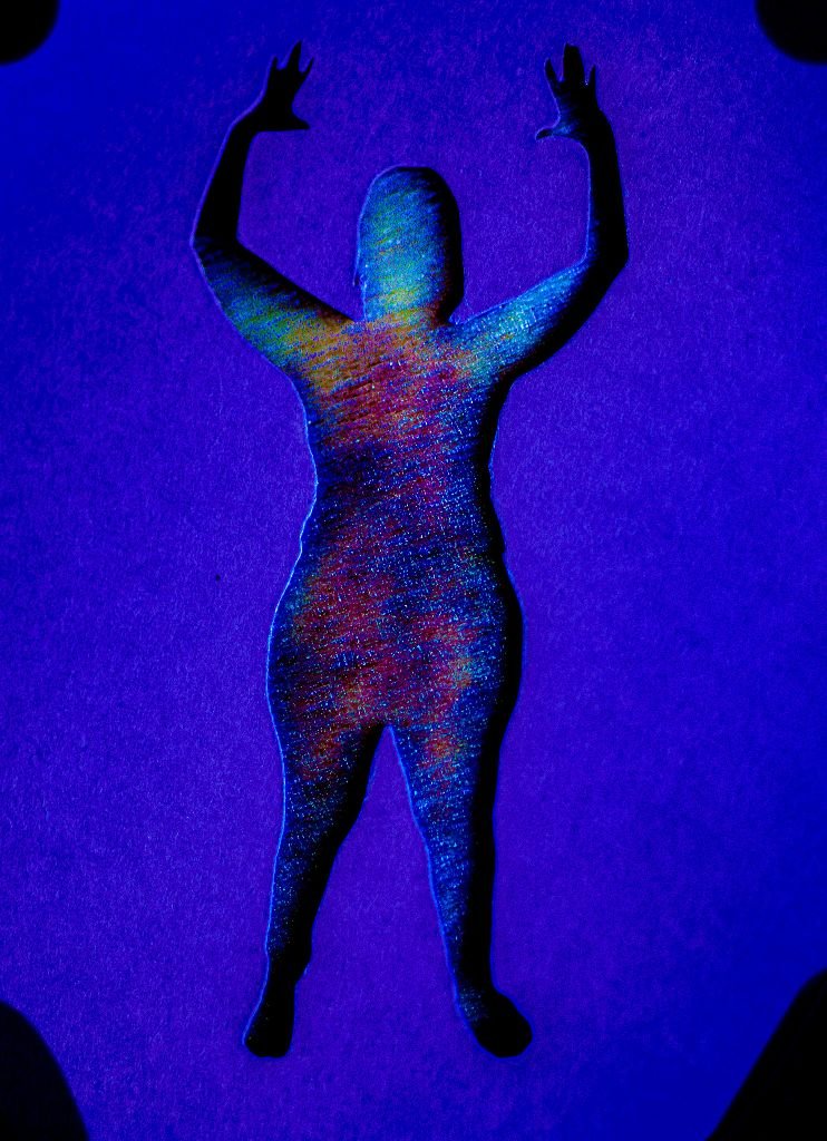 Bruised, a universe within: I run into things a lot causing my body bruises in all kinds of colors. I took this photo with my full body stencil, hands over head, face on, over a bruise on my thigh. I actually took a series of photos as the bruis