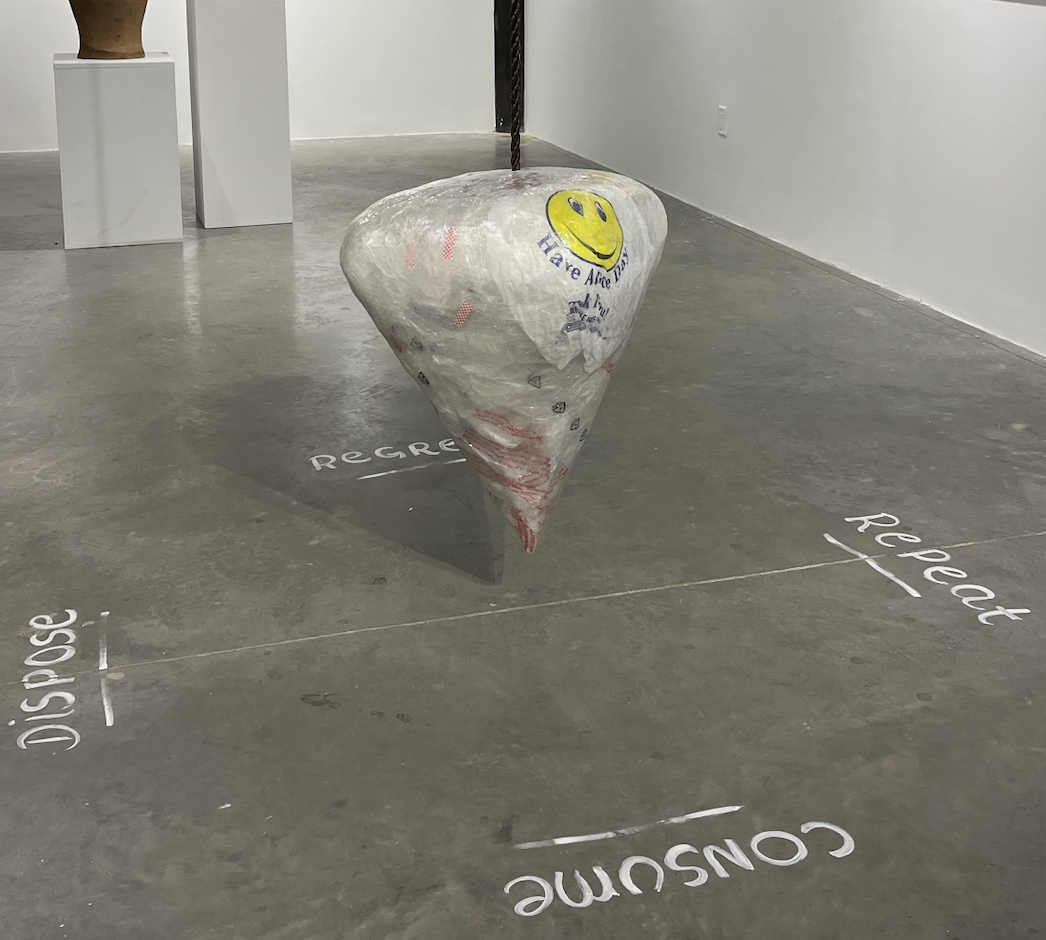 Interactive plastic sculpture of a Pendulum