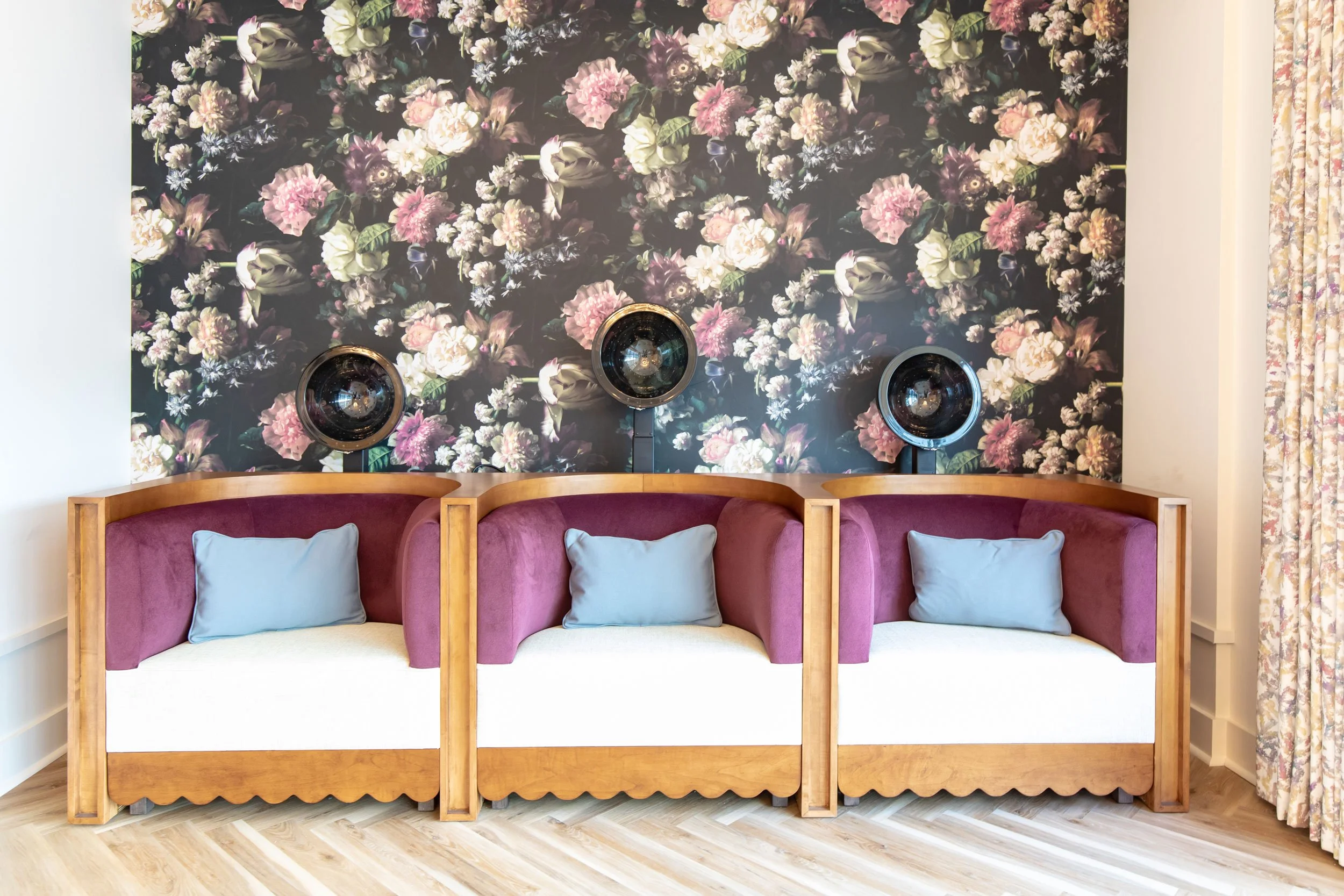 banko-design-american-house-senior-living-community-salon-floral-wallpaper-pink-cushions.jpg