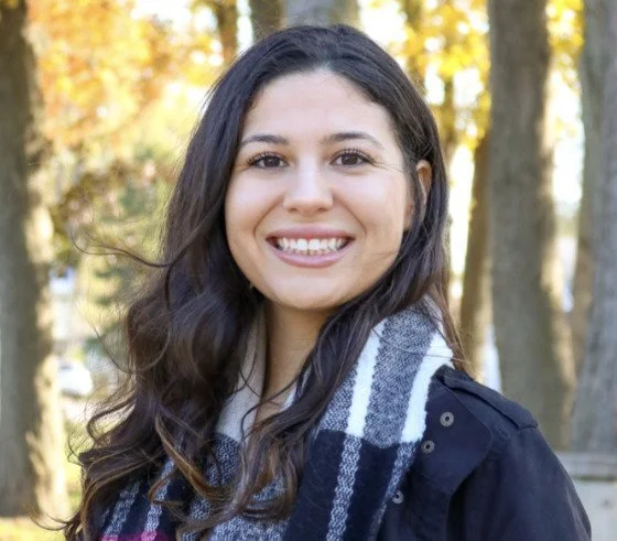 headshot of Domonique