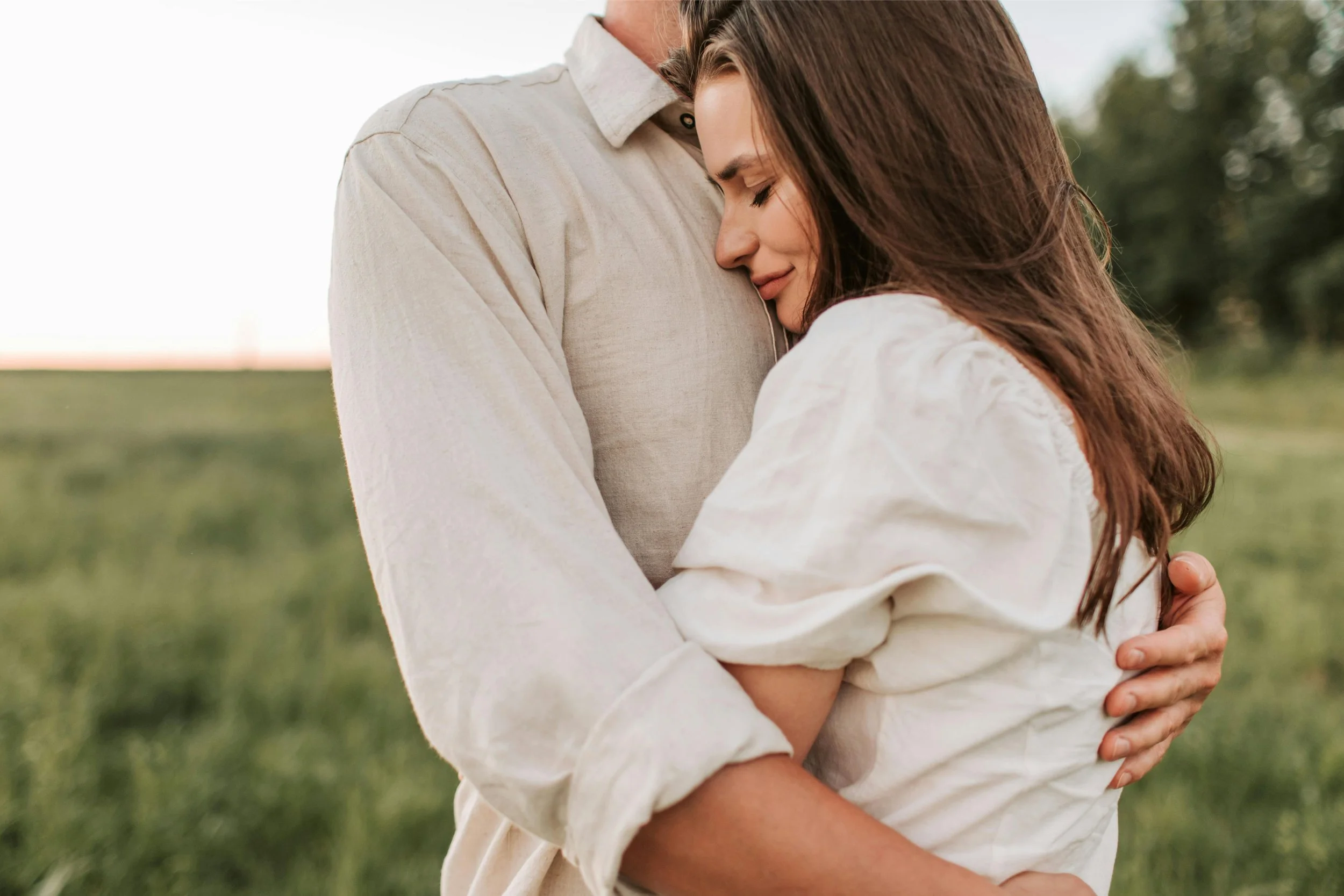 Couple embracing and finding connection through marriage counseling Worcester for parenting challenges