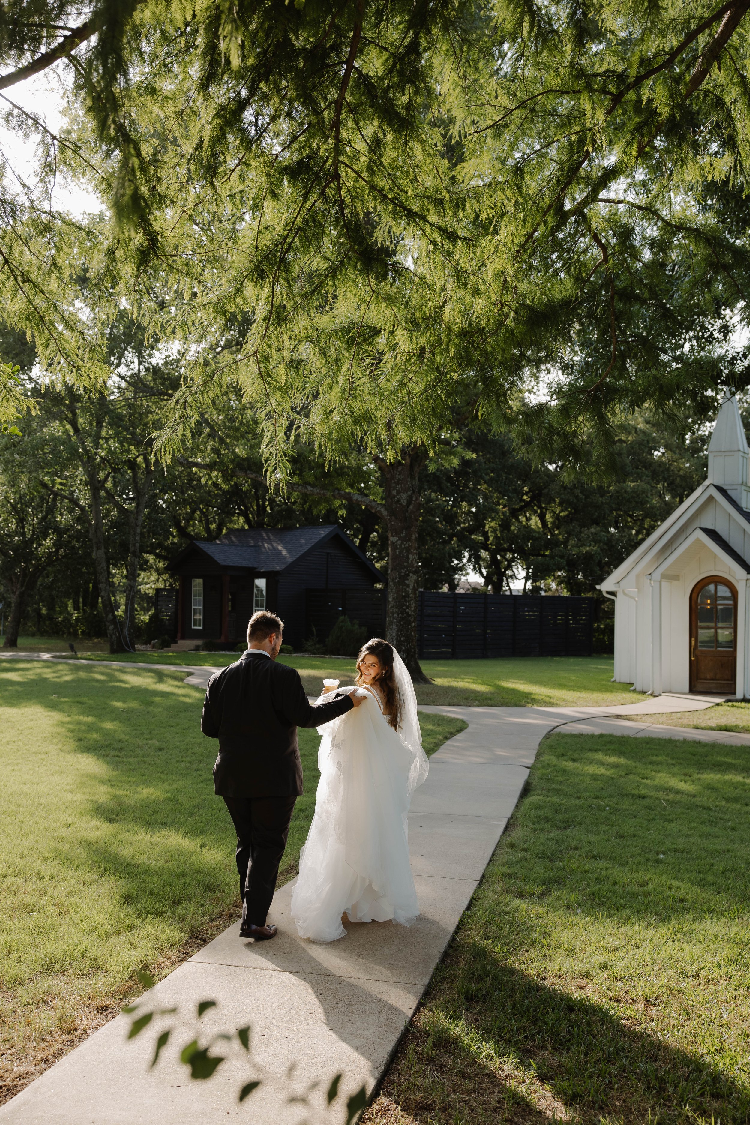 bride and groom dallas texas holding coffee at the emerson venue