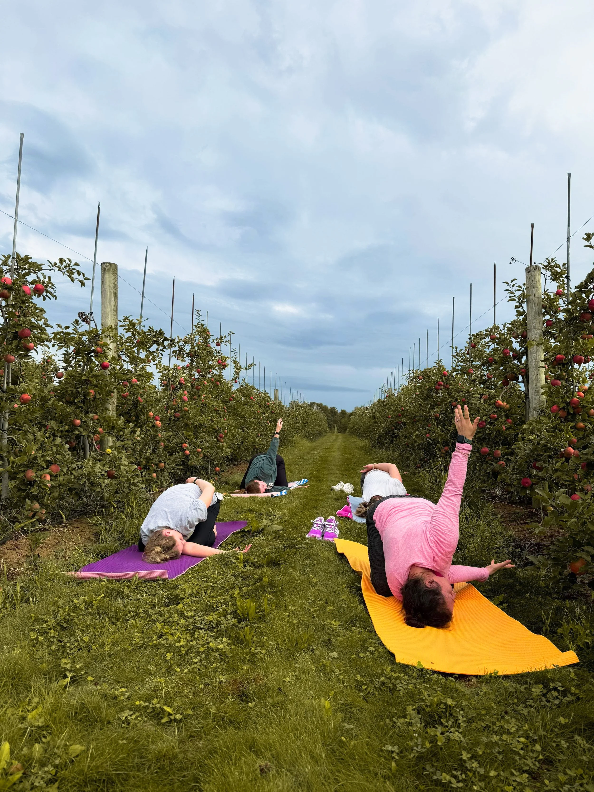 Yoga instructor teaching a yoga class