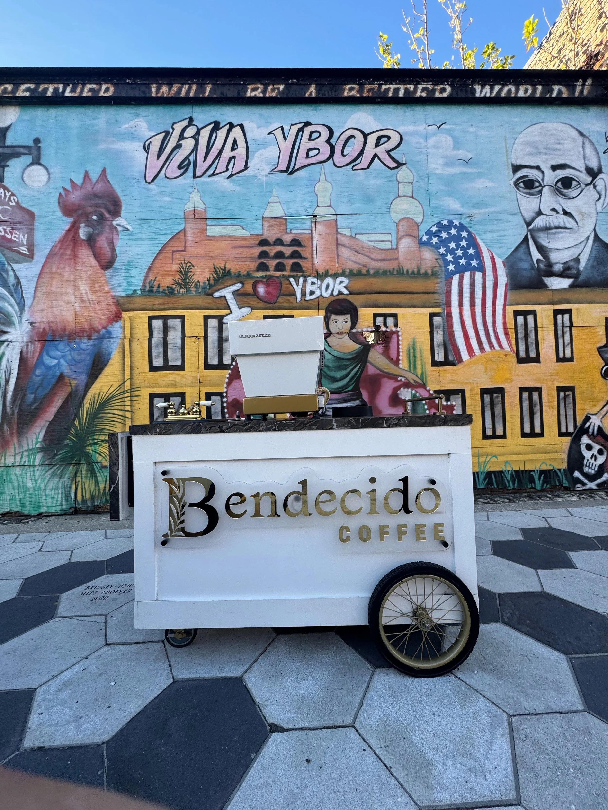 Bendecido Coffee espresso cart in front of the Viva Ybor mural in Ybor City, Tampa