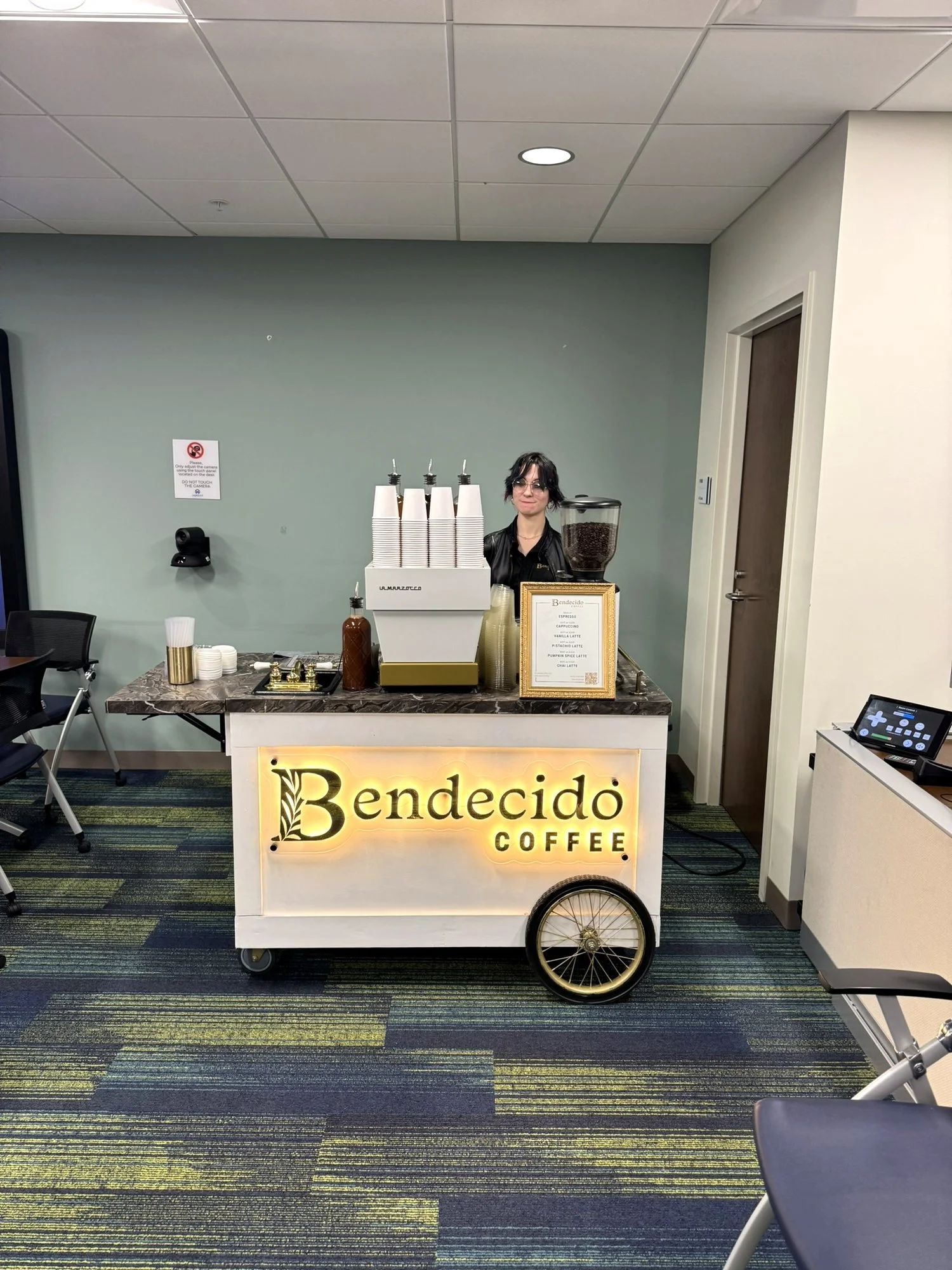 Illuminated Bendecido Coffee cart at an office break area in New Tampa