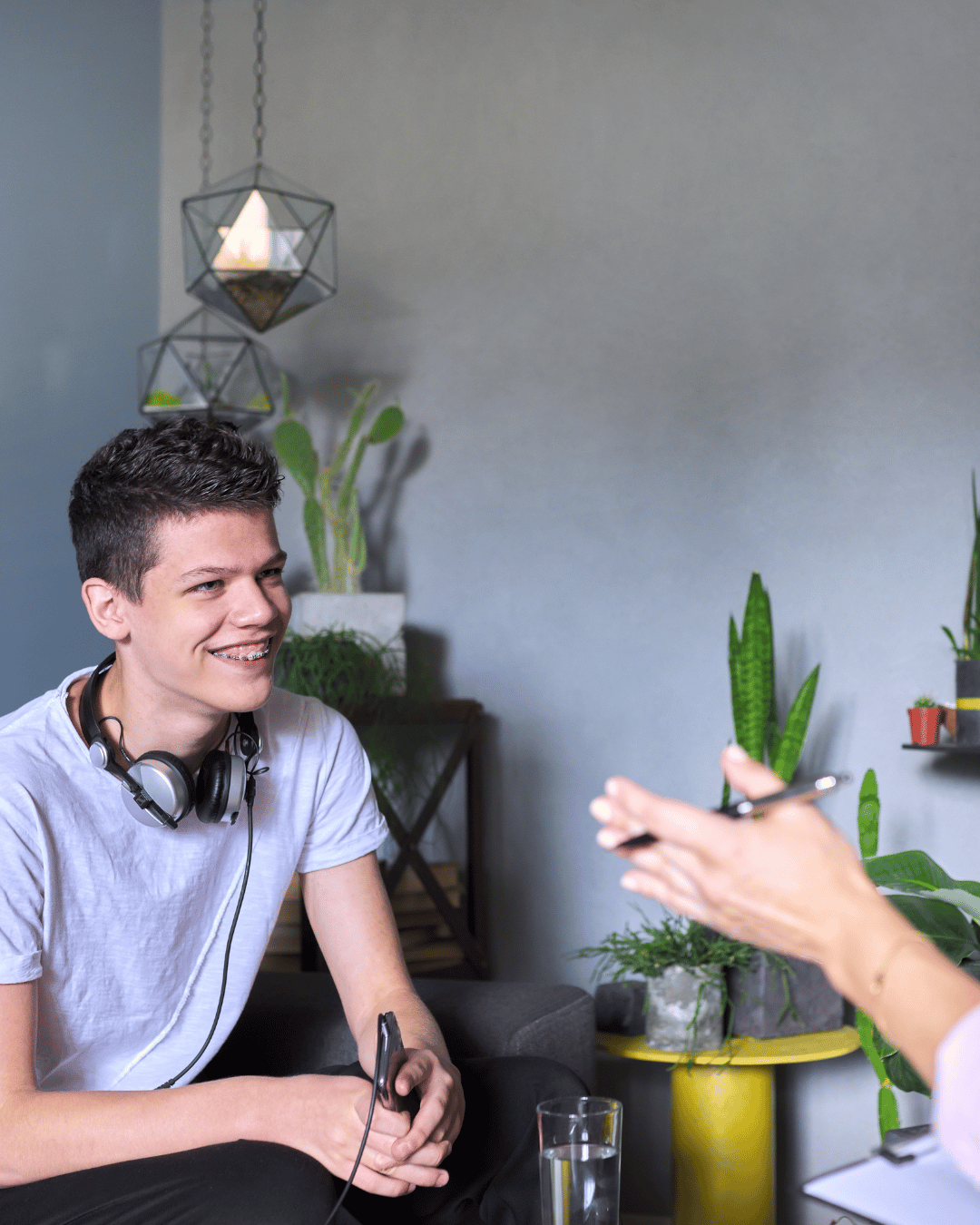 a teenage talking to a counselor