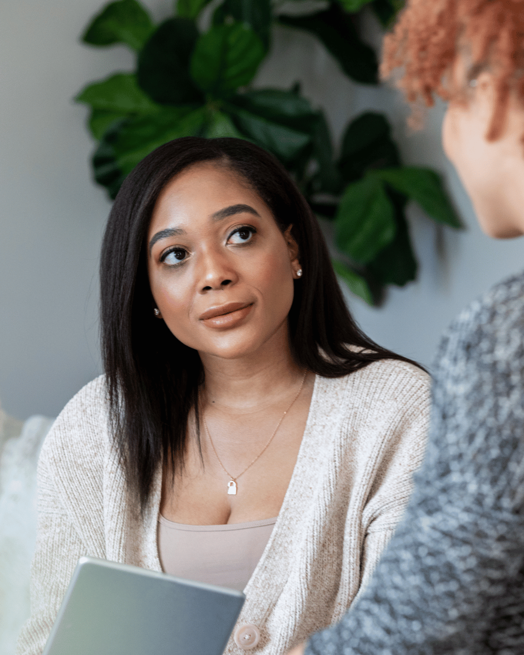 a woman talking to a therapist