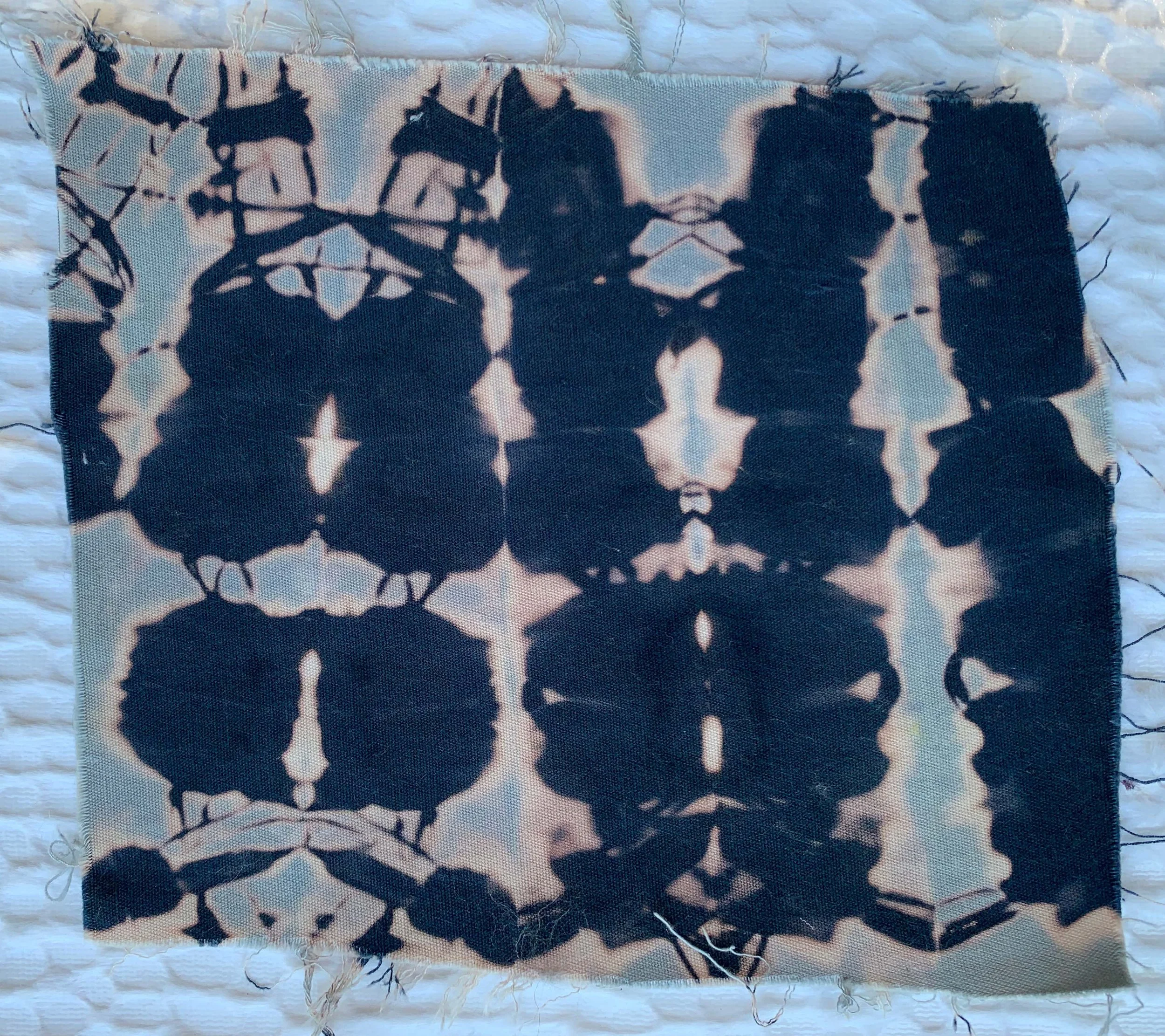 Cotton sample, Fabric was immersed in a bleach water bath using a folding technique, 4"x 4"