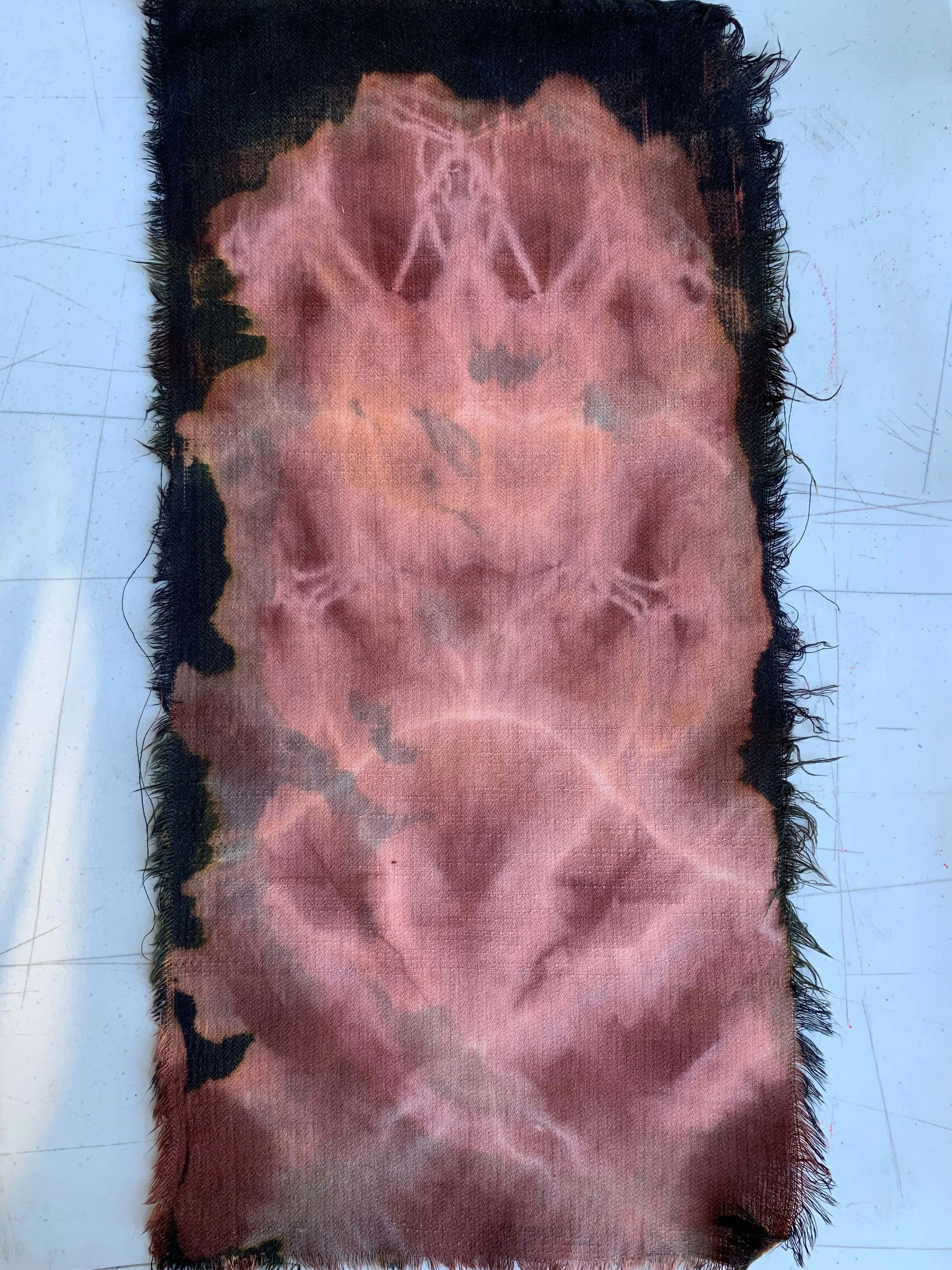 Cotton sample, immersed in bleach bath using clamping technique, 10" x 4"