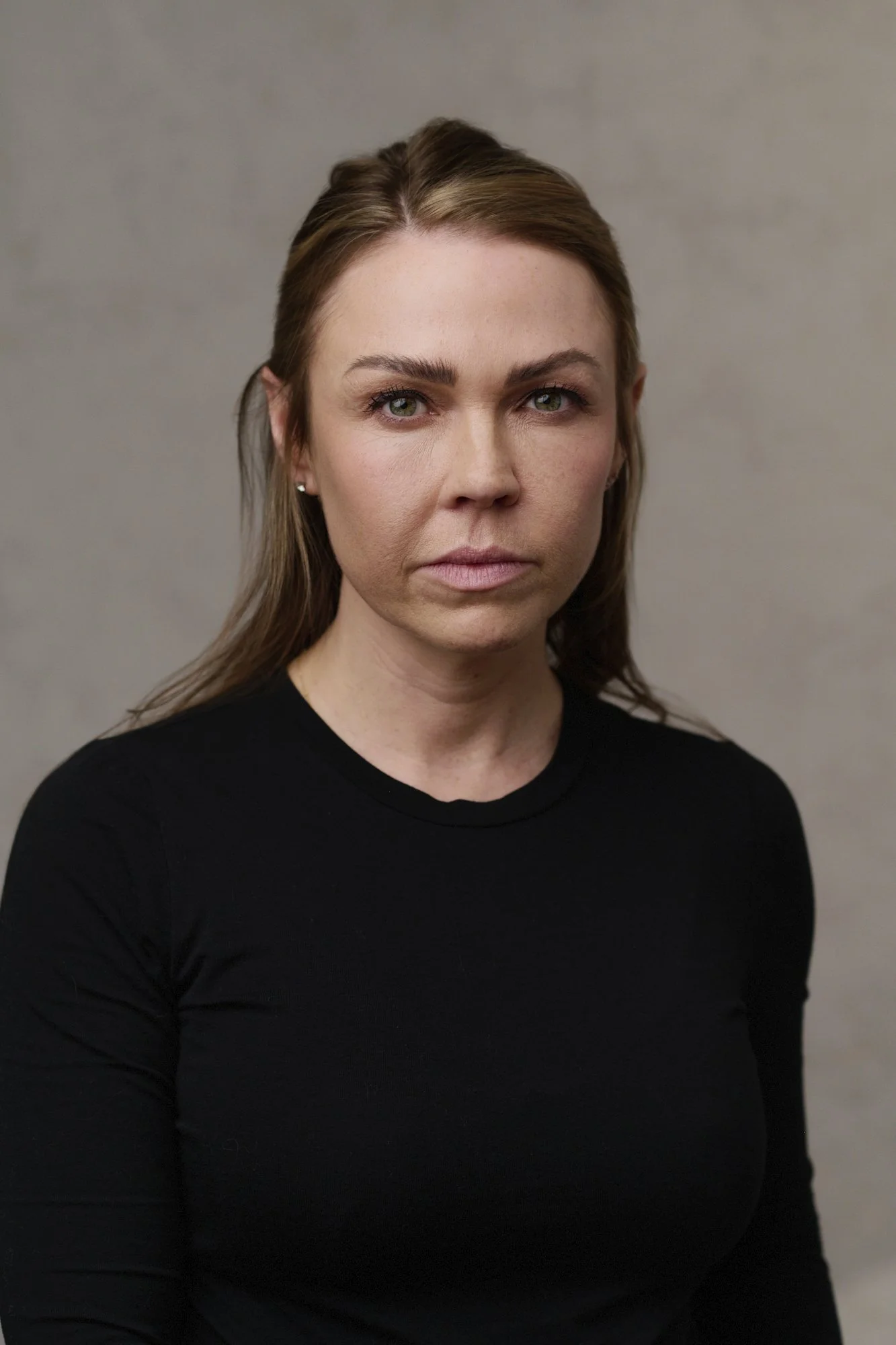 Studio headshot of Adele Silva photographed in a Manchester portrait studio