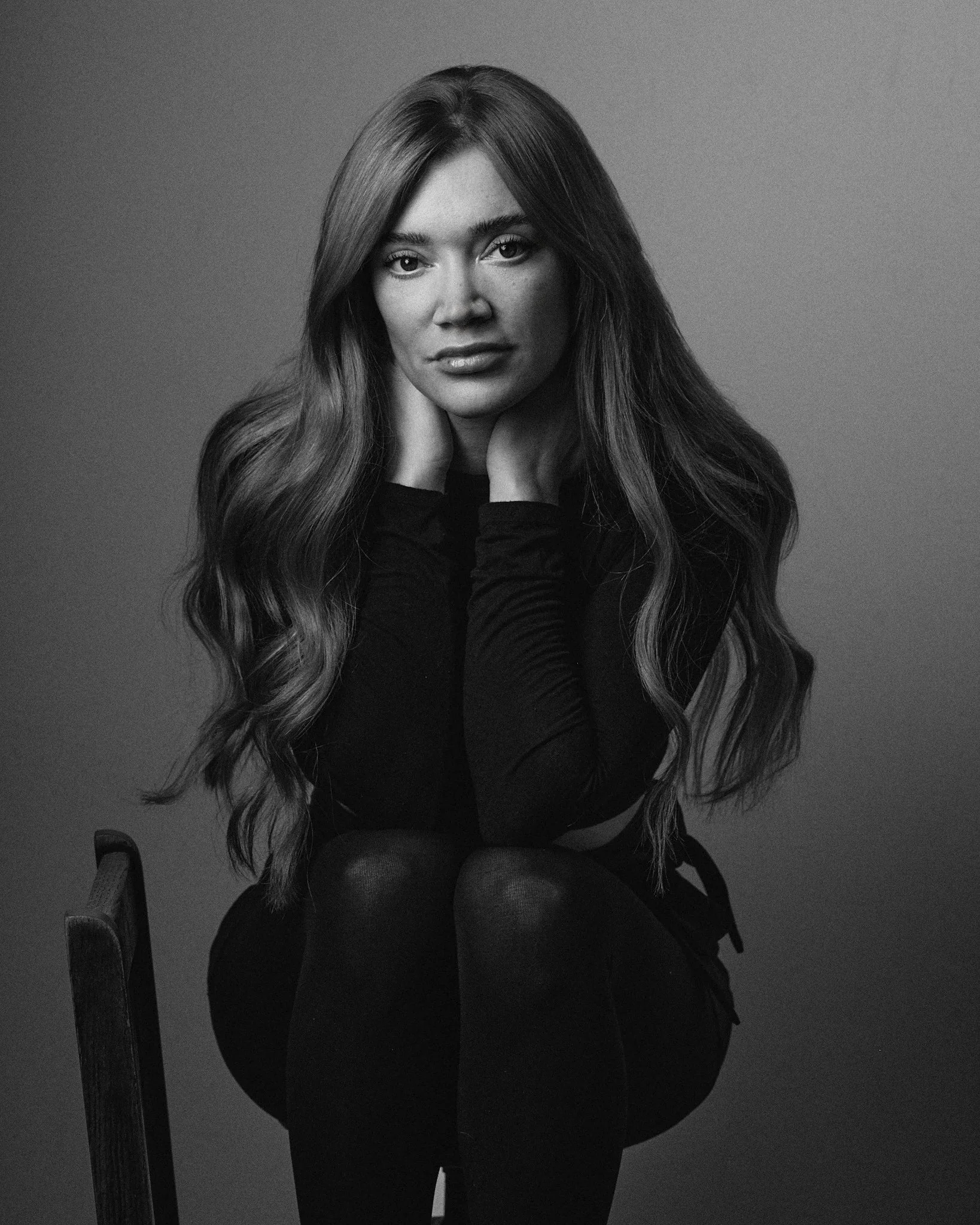 Hollie-Jay Bowes seated portrait photographed by James Melia in Manchester studio