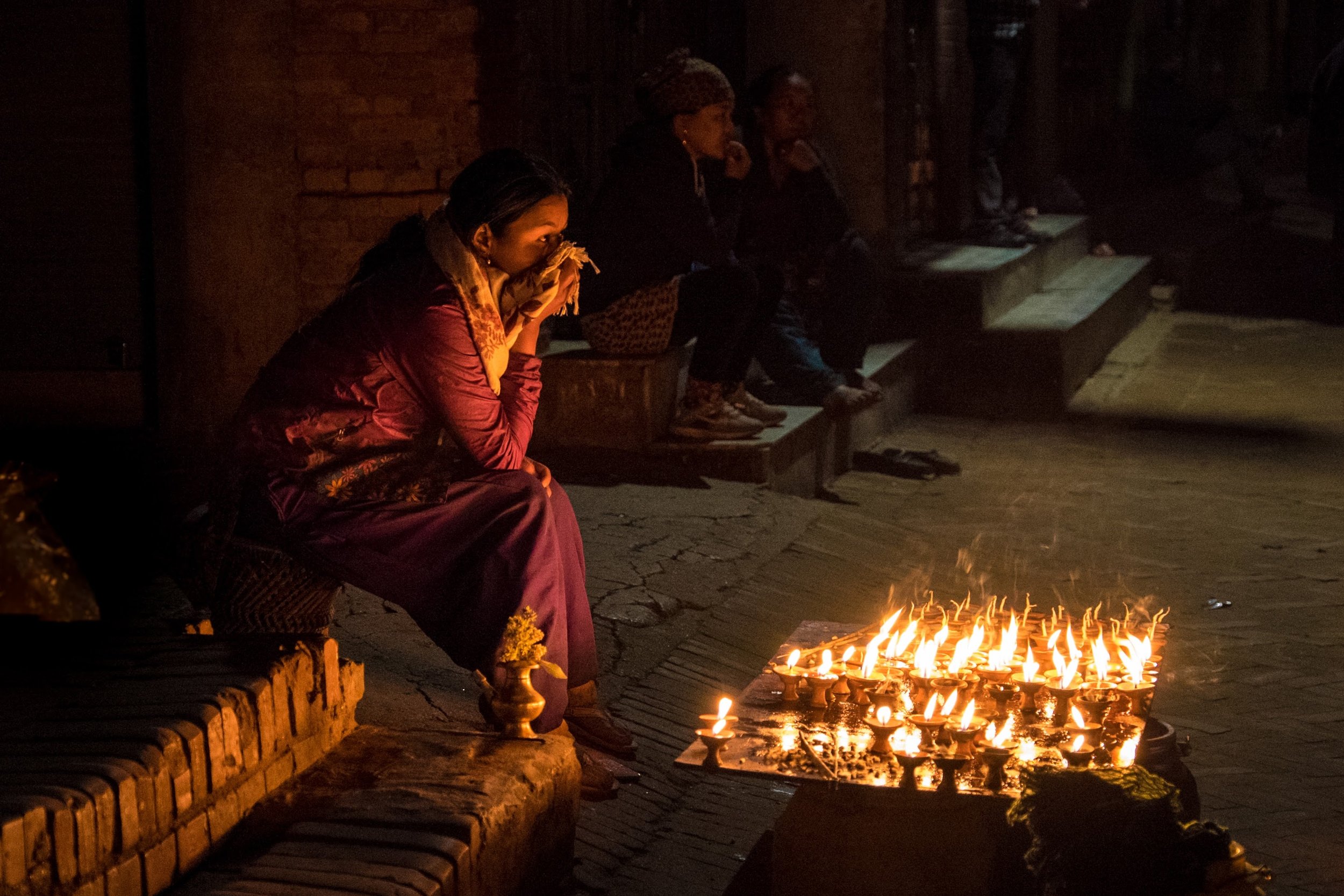 Candle seller at Boudhanath Stupa in Kathmandu