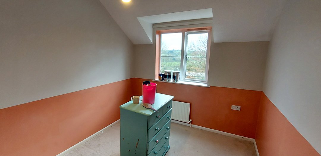 Renew Decorators | Interior Painting Bold Orange Two Tone Room