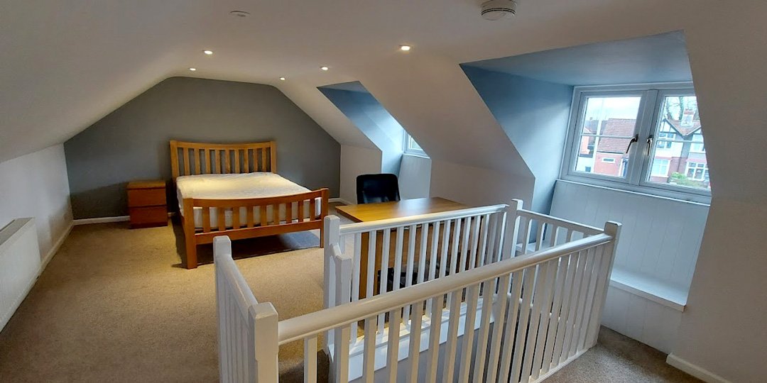 Renew Decorators | Interior Painting Attic Bedroom with Alcoves