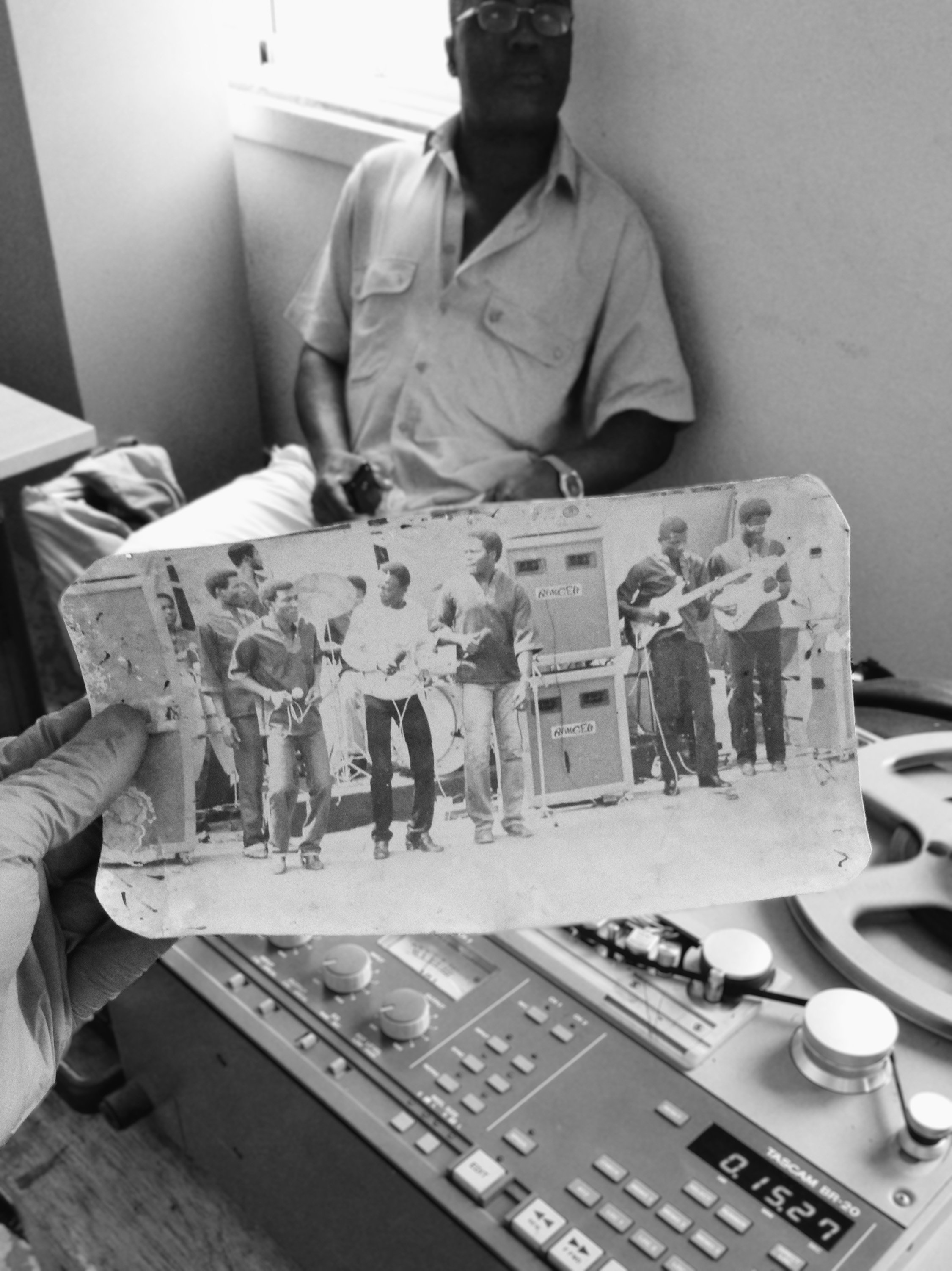 Photograph featuring 'Africa Negra' and Leonídio Barros in the background watching us work at RNST