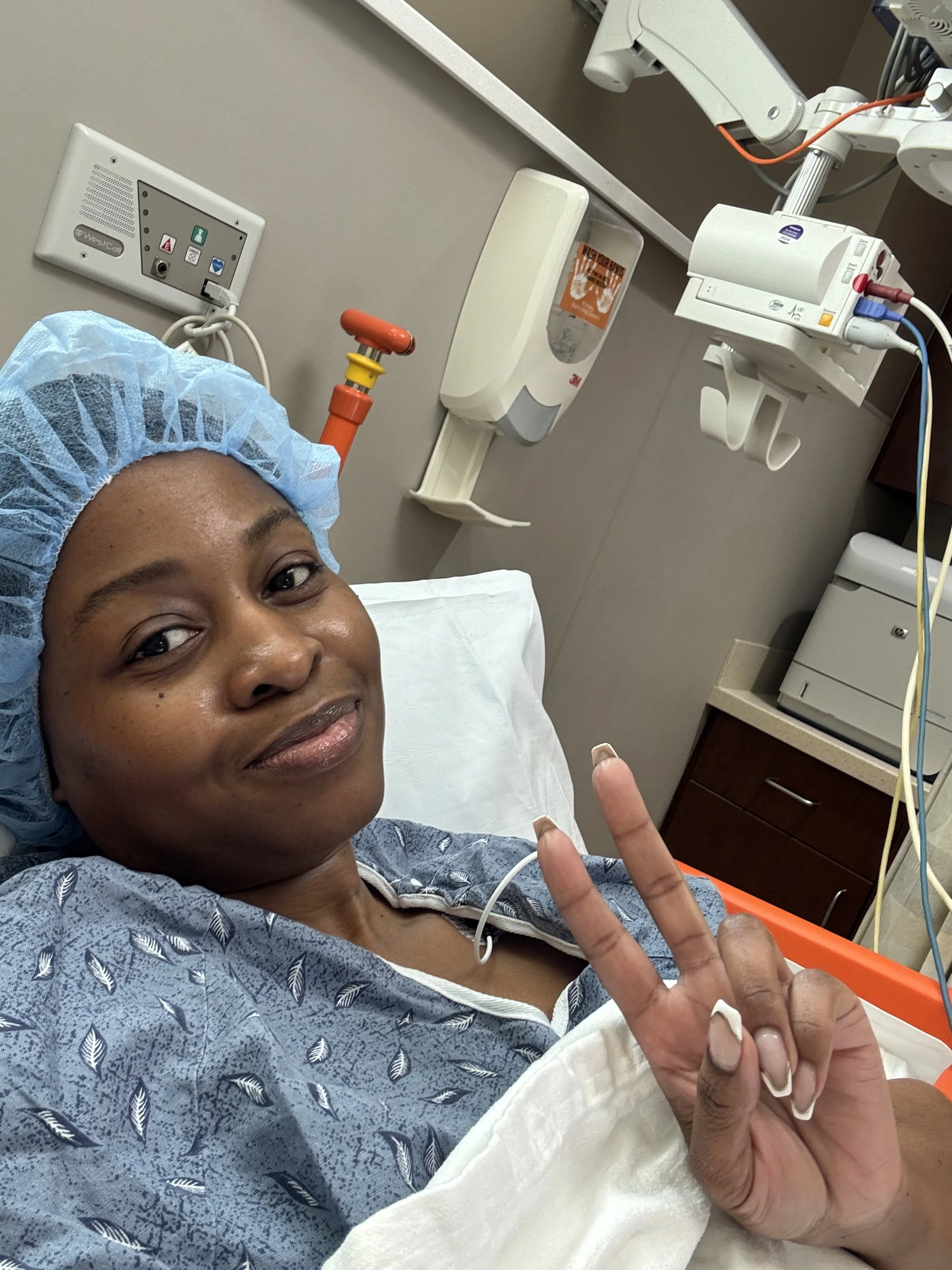 Kimberly M. Hooks in hospital before colonoscopy leading to Ulcerative Colitis diagnosis