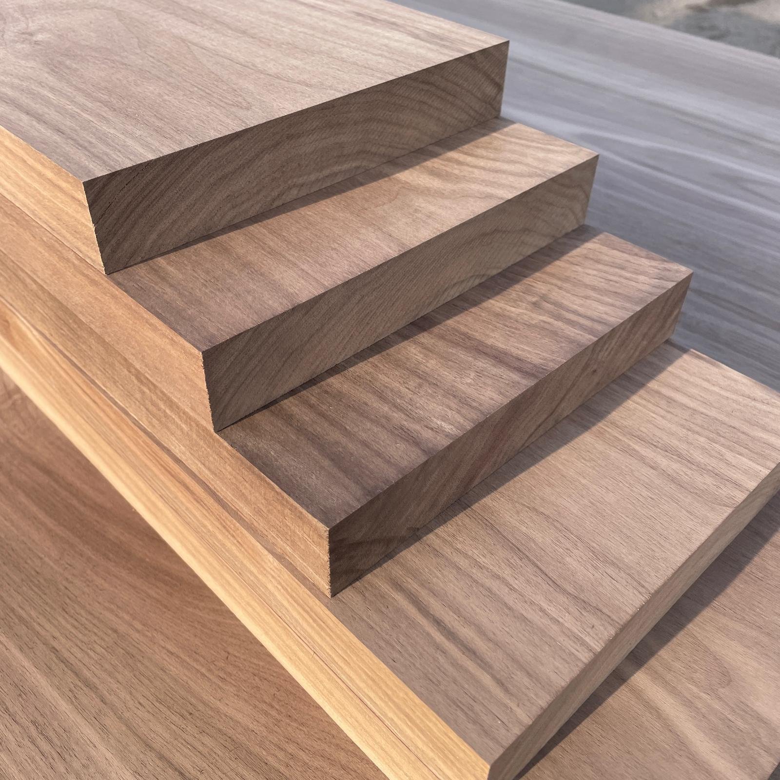 Solid Walnut stair treads 25mm thick.