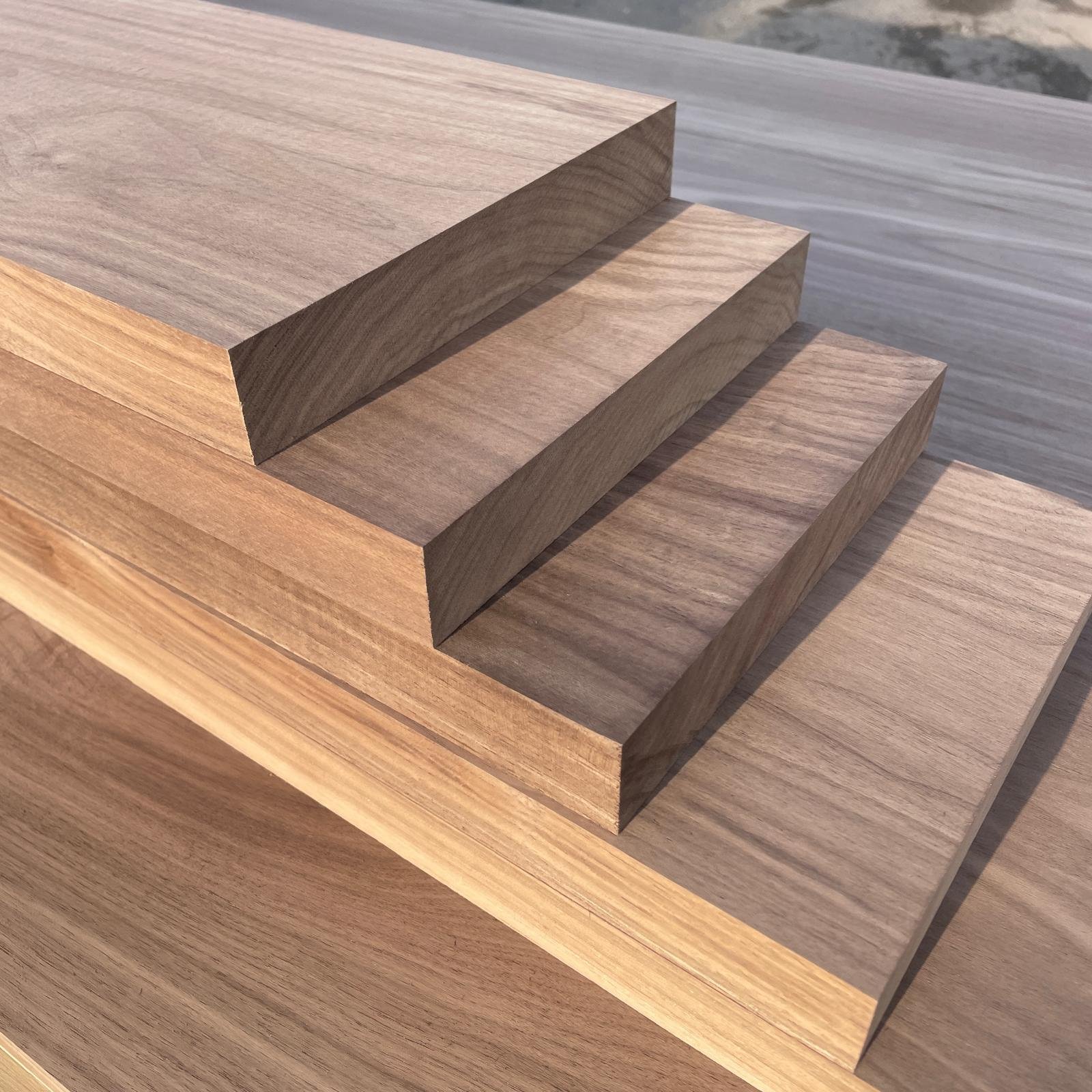 Wide solid Walnut stair treads.