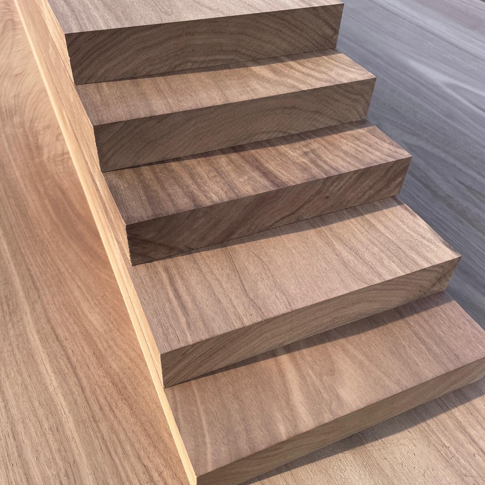 Solid Walnut stair treads 40mm thick.