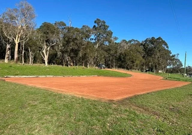 Quacks Farm car park covered with a Laterite spray seal