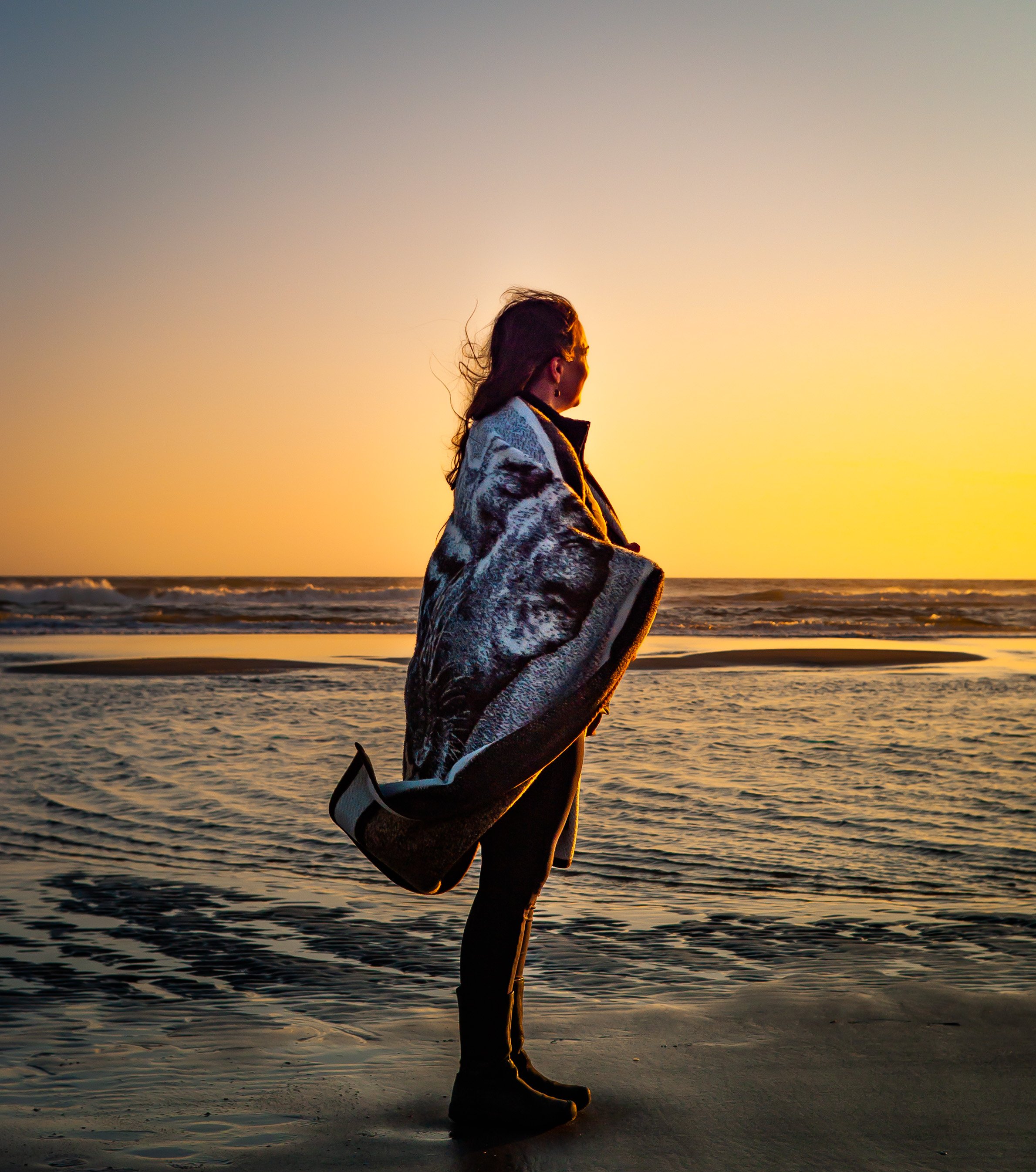This one was not candid. Spoke with this woman about the beauty of the coast, and after a conversation about the waves, she allowed me to take her portrait. Summer, 2022.