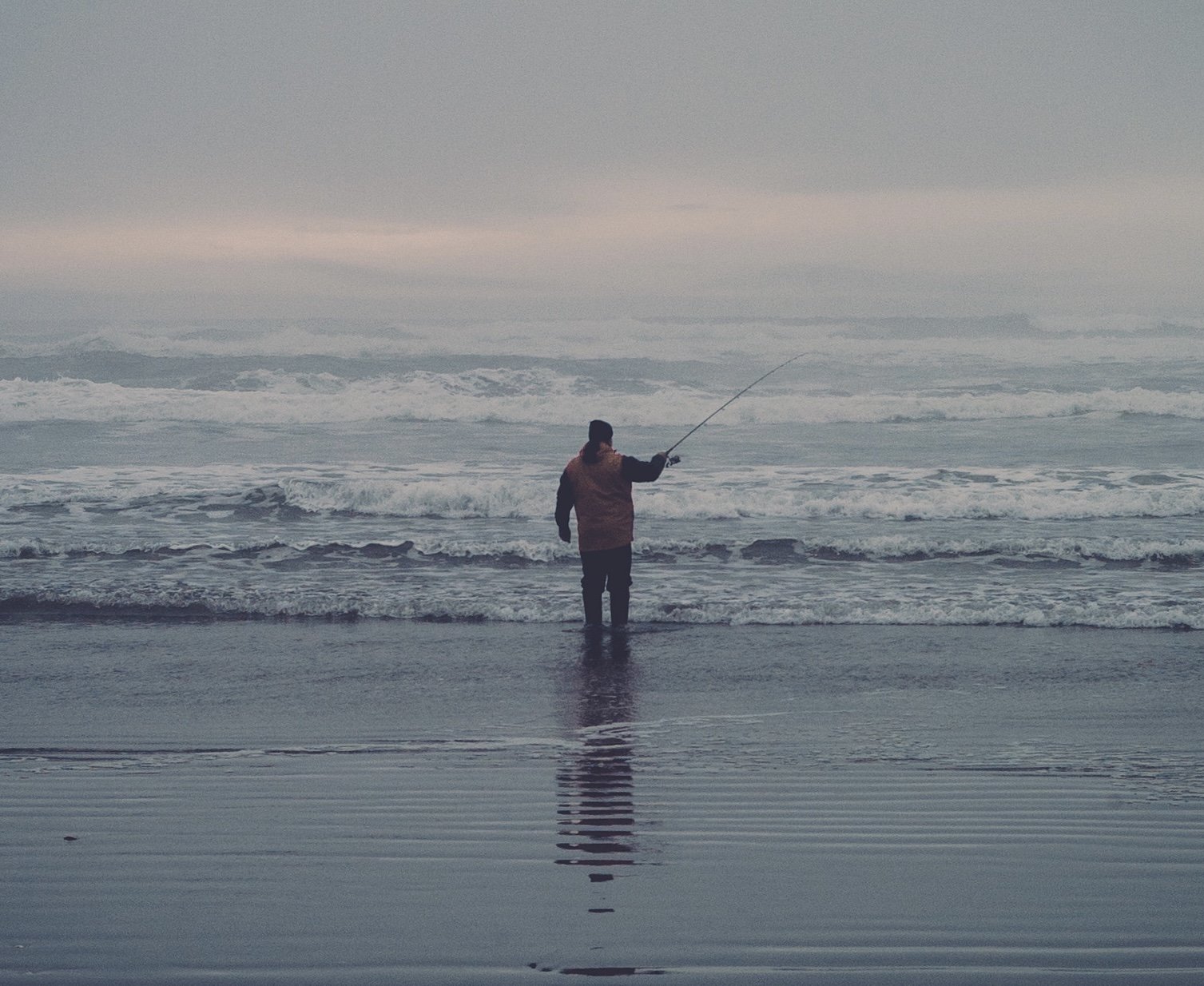 I had never seen someone fishing on the beach until this moment. March, 2023