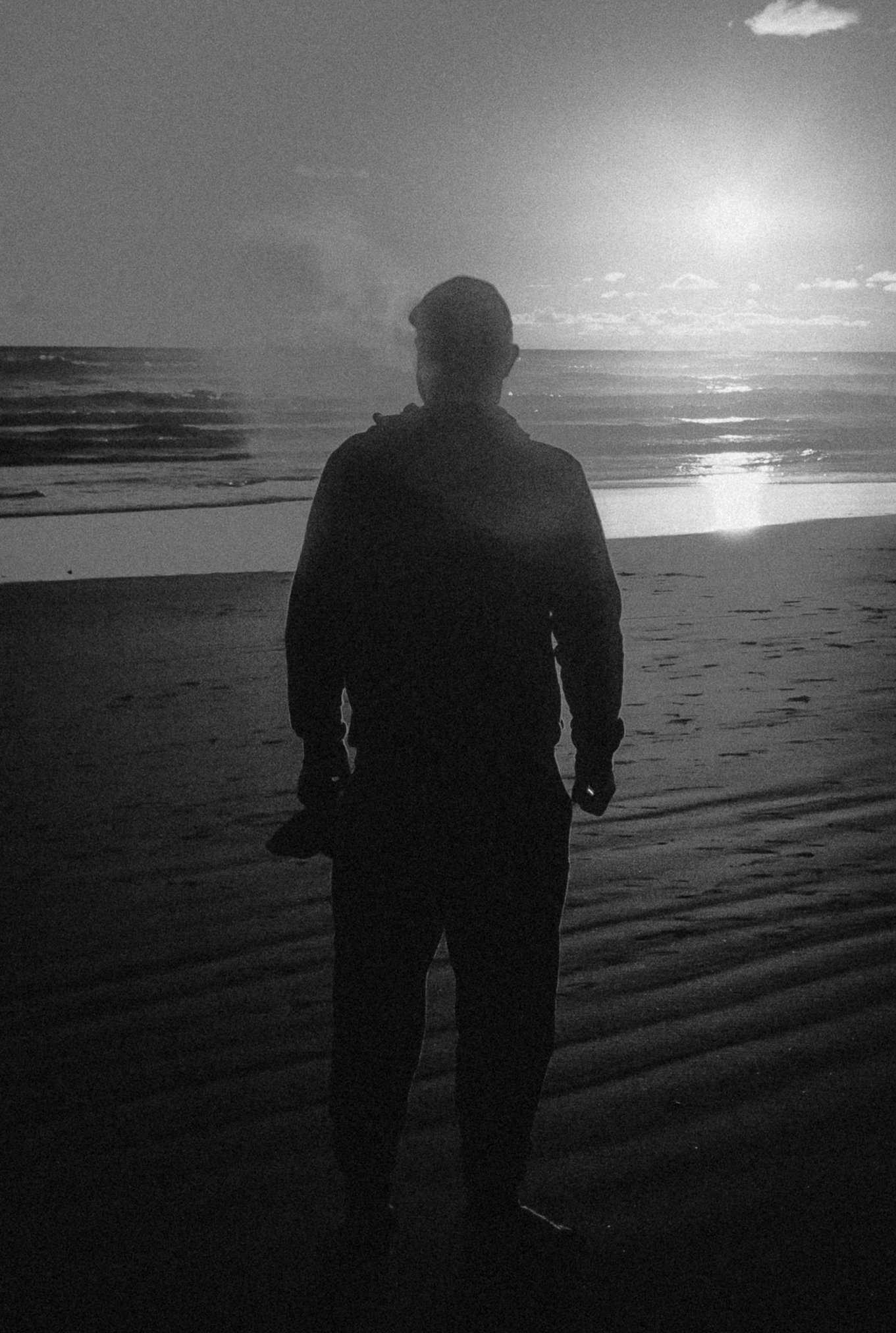 Smoking a pipe on the beach might be the best relaxation for many. Not candid. Summer of 2019.