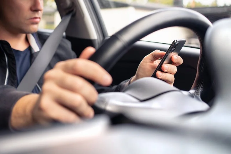 Texting While Driving Ticket in NY: The Costs