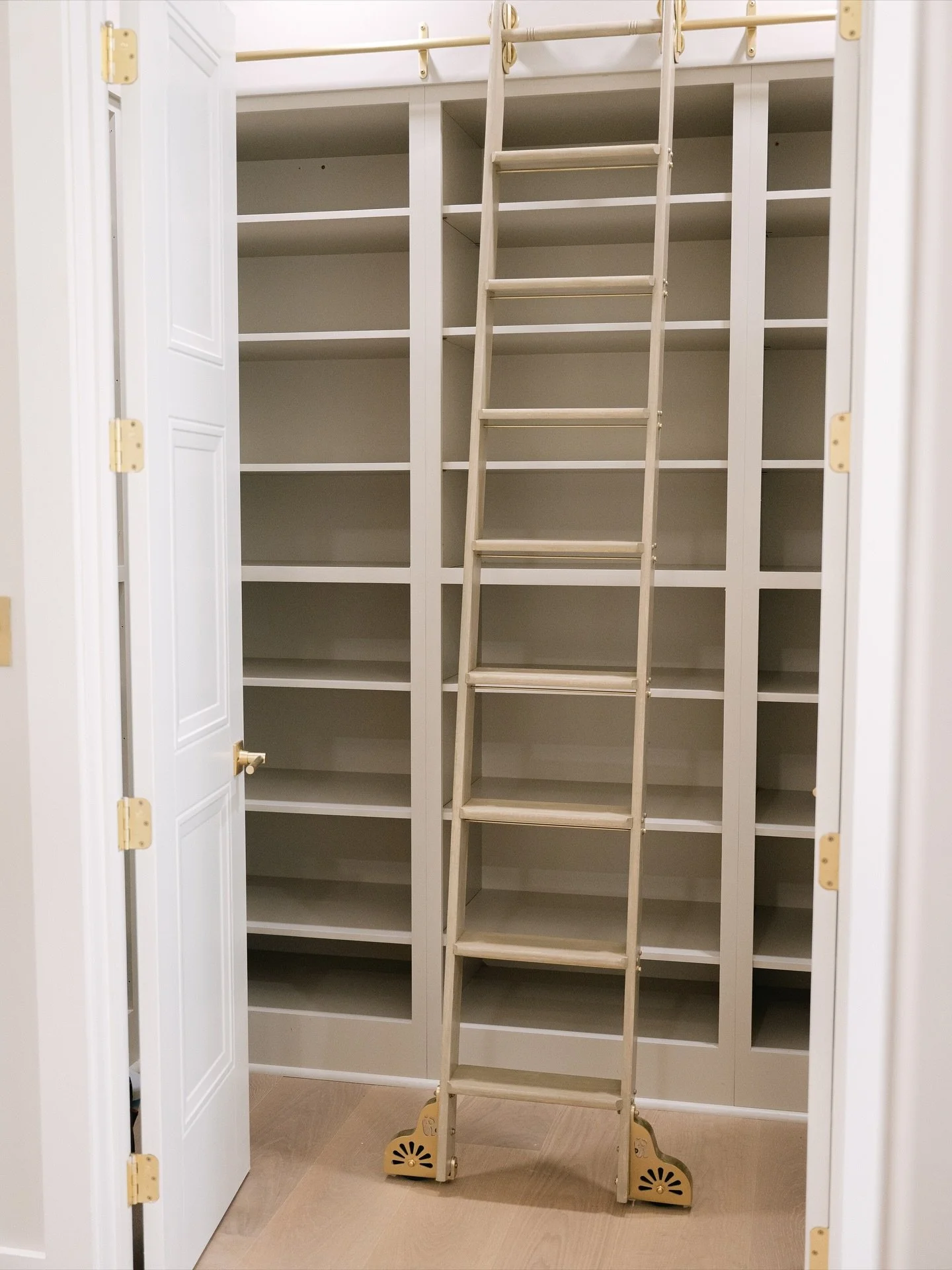 This pantry ladder might just be the most fun and functional detail in the whole house. This pantry shelving paired with a rolling ladder takes storage to a whole new level and honestly, we&rsquo;re obsessed. Because let&rsquo;s be real&hellip; snack