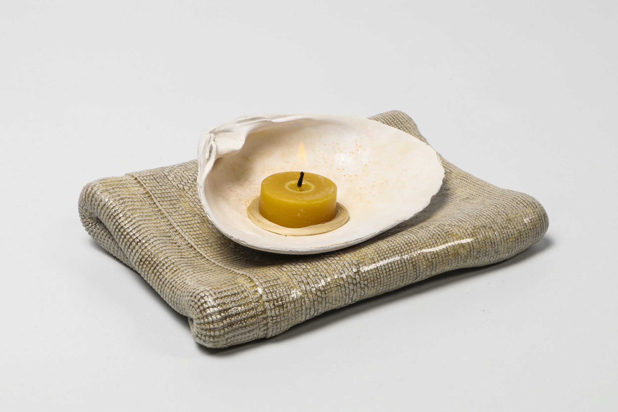 Small offering
Stoneware, shell, hair, beeswax candle 
2021
