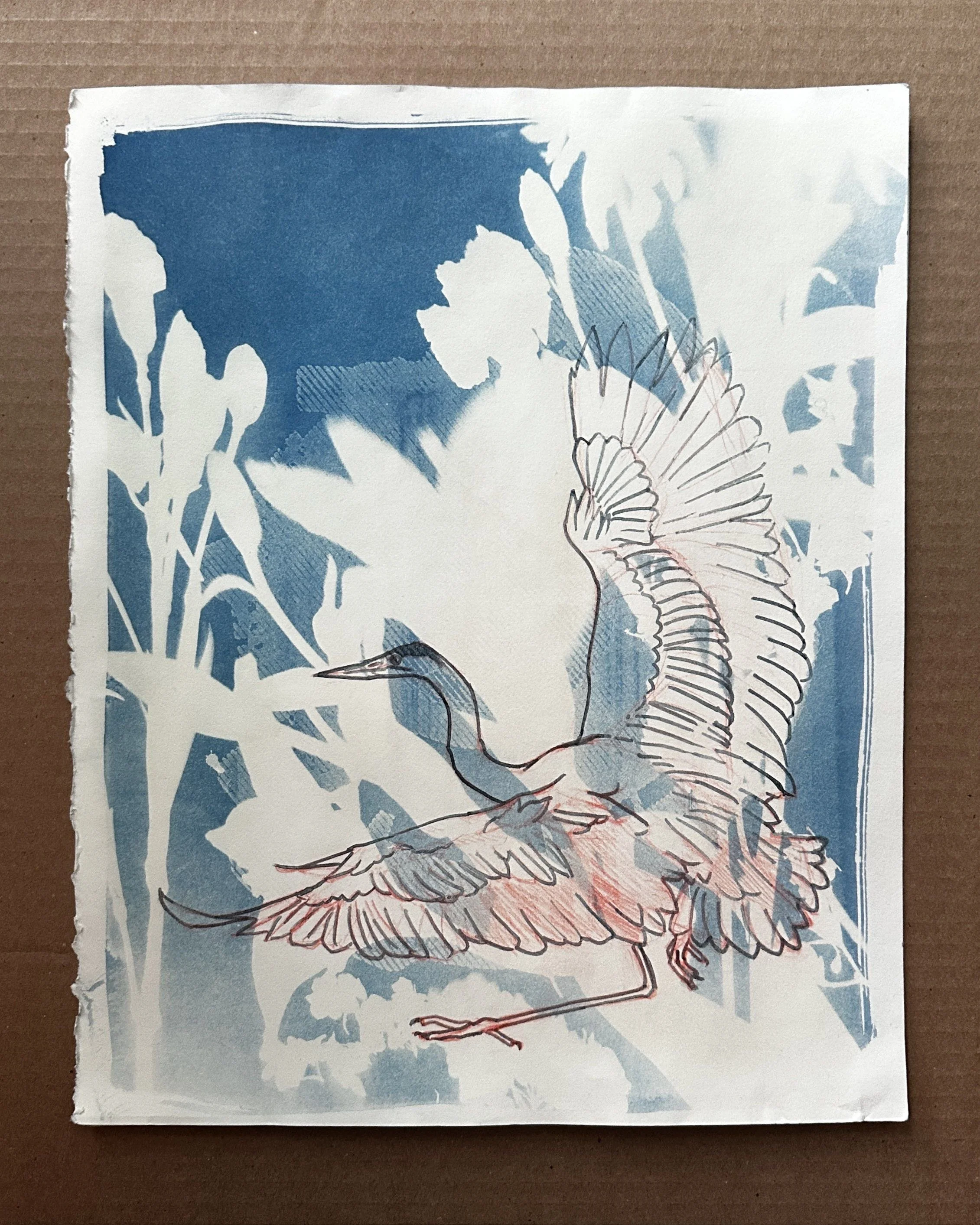 A blue and white stenciled image of a bird, likely a heron or crane, with detailed linework on its feathers, standing among some foliage on textured paper.