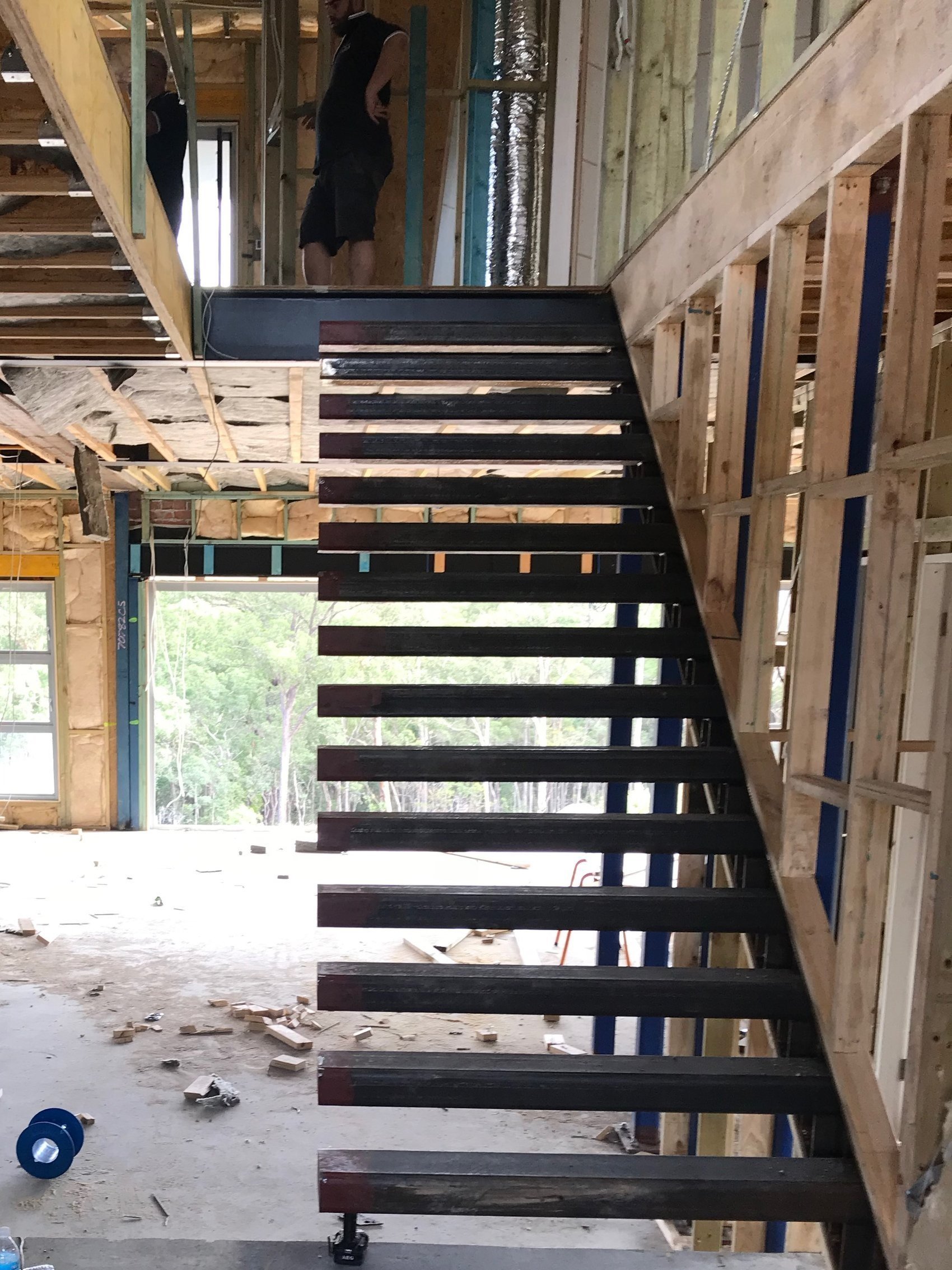 Floating staircase in architectural home