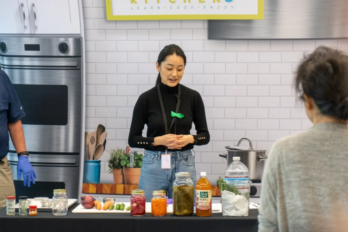 Dietitian presenting functional nutrition tips at corporate wellness workshop.