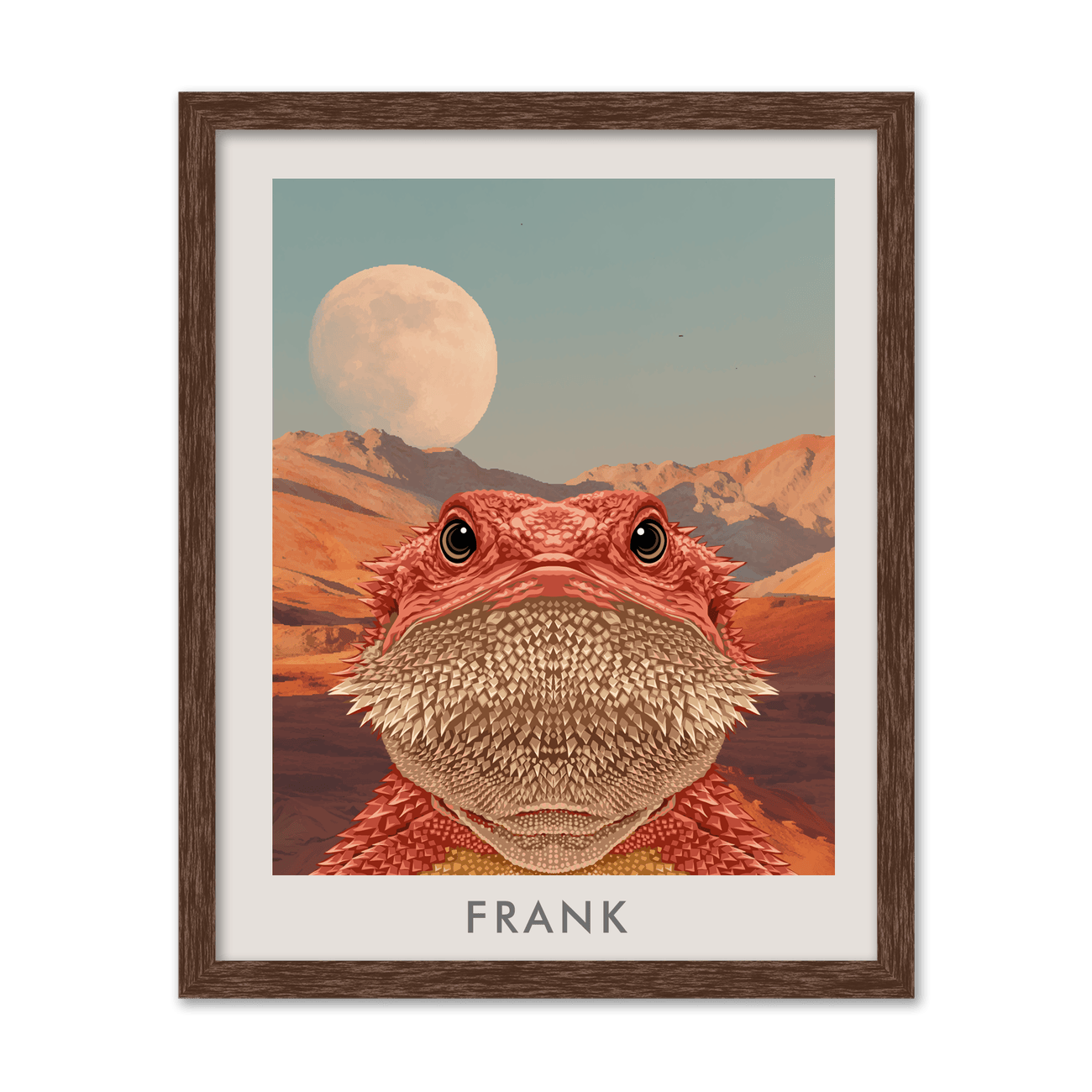 Framed bearded dragon portrait of Frank with desert mountains and moon in a walnut frame.