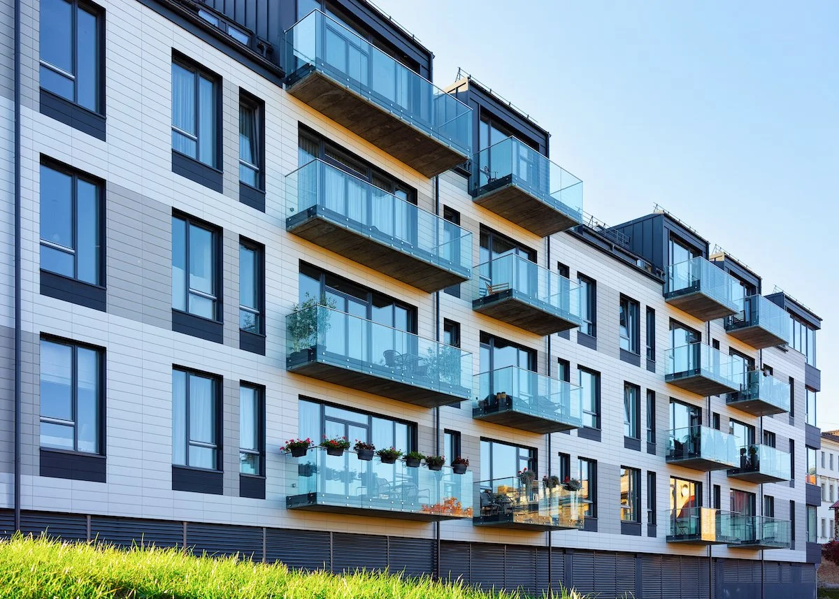 new-modern-apartment-house-building-including-place-copy-space.jpg