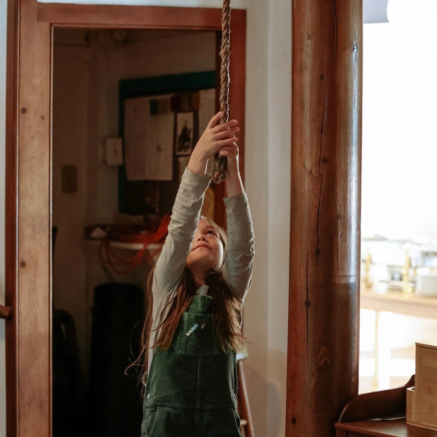 Following in her mother&rsquo;s footsteps, Oona rings the bell to call us to lunch, keeping a beloved campus tradition alive.
