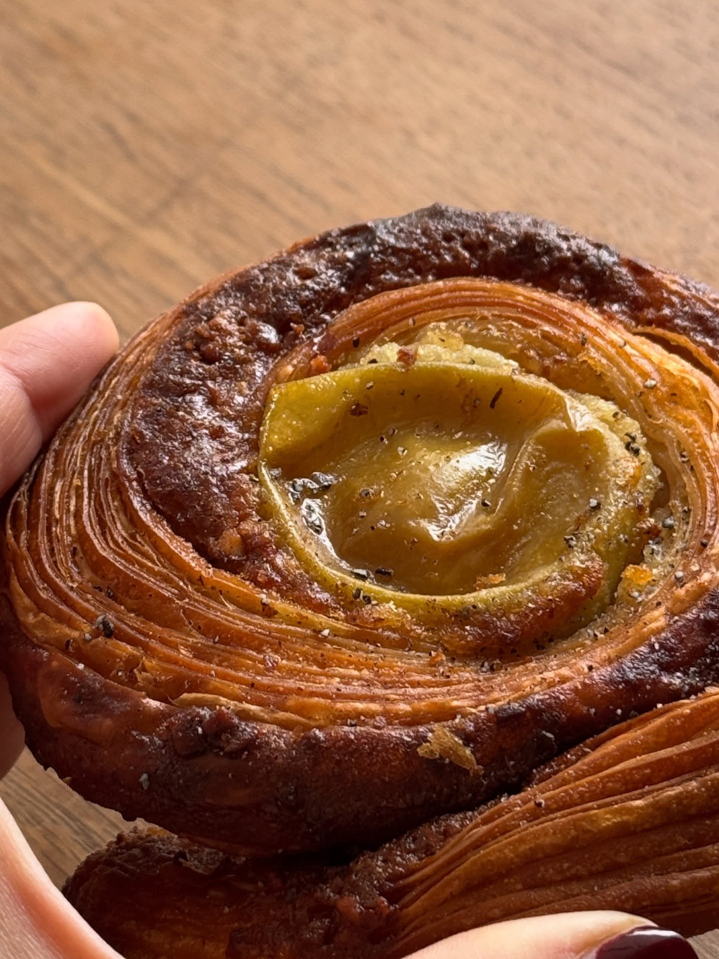 Apple-cardamon danish that crumbles on your tongue, warm coffee, cold morning and crispy leaves under your feet. Does it get more cosy than this? ☕️🥮🍁

If you wanna know where to get the best one, you'll find out in our local guide filled with hear