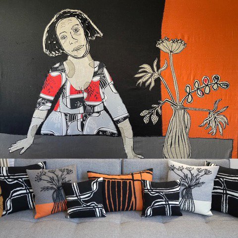 Woman-With-Flowers-and-cushions.jpg