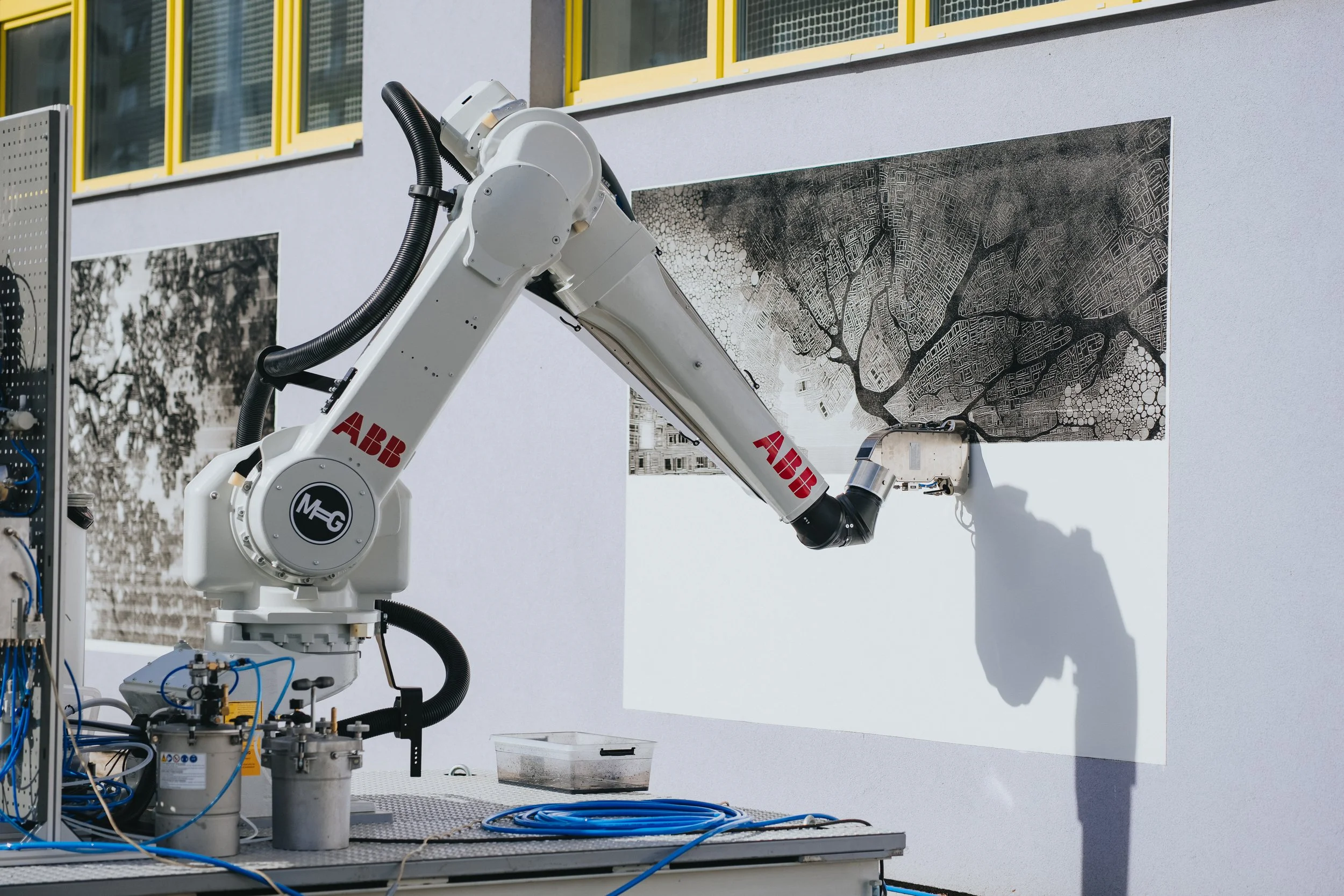 ABB Robot Paints AI Mural at City=Gallery