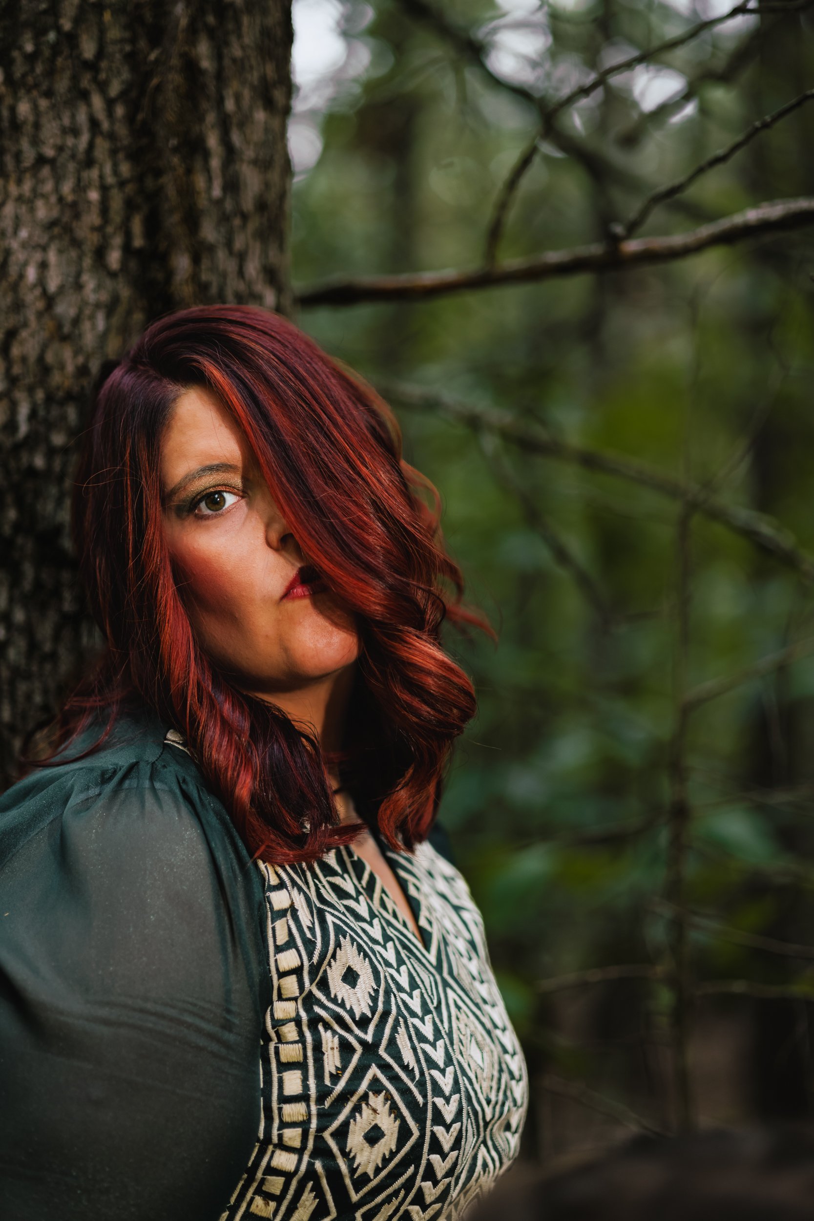 Red Headed Woman In Woods In Dress