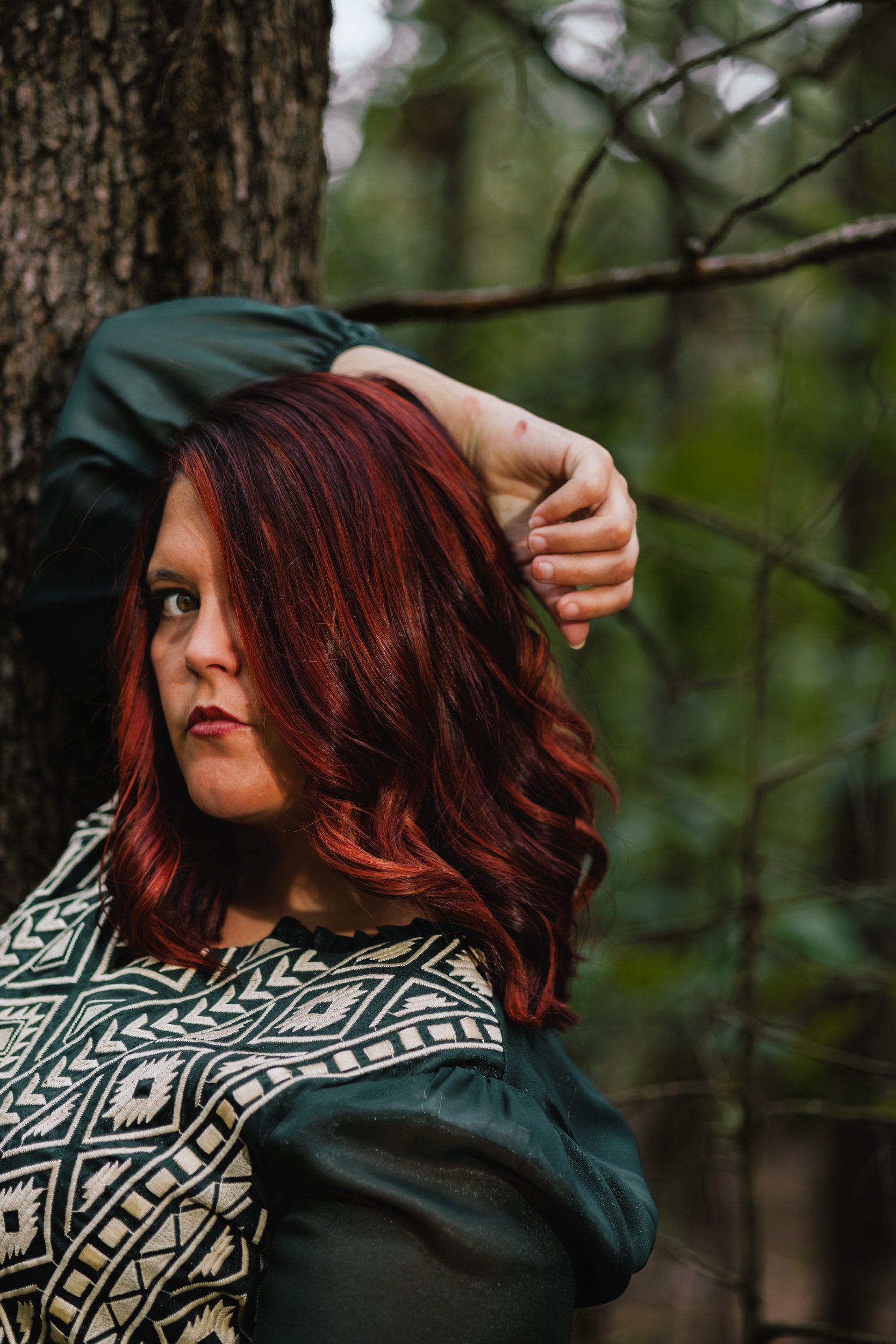 Red Headed Woman in Woods In Dress