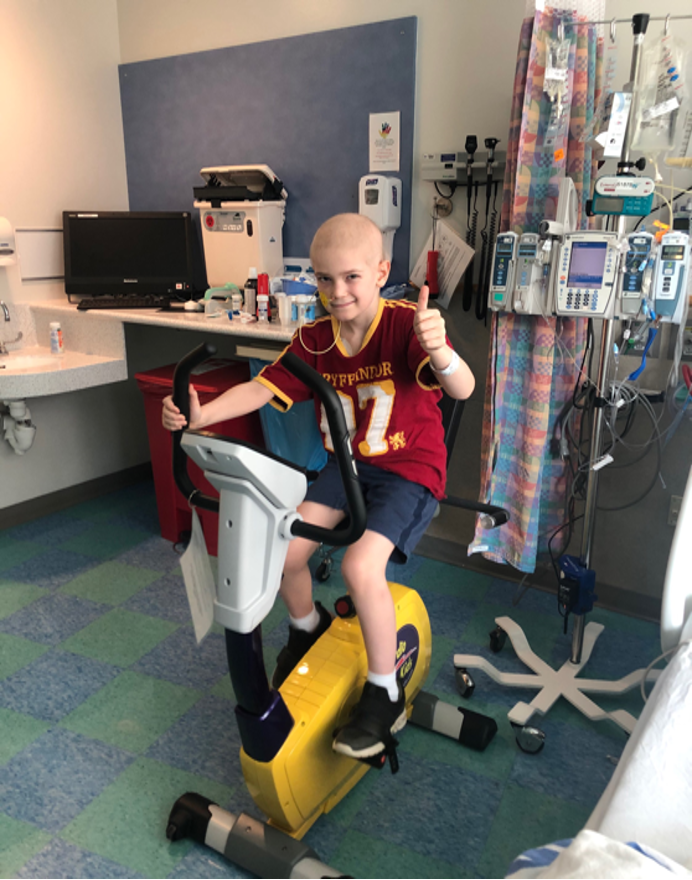 Child Patient on E-Bike--Integrative Oncology